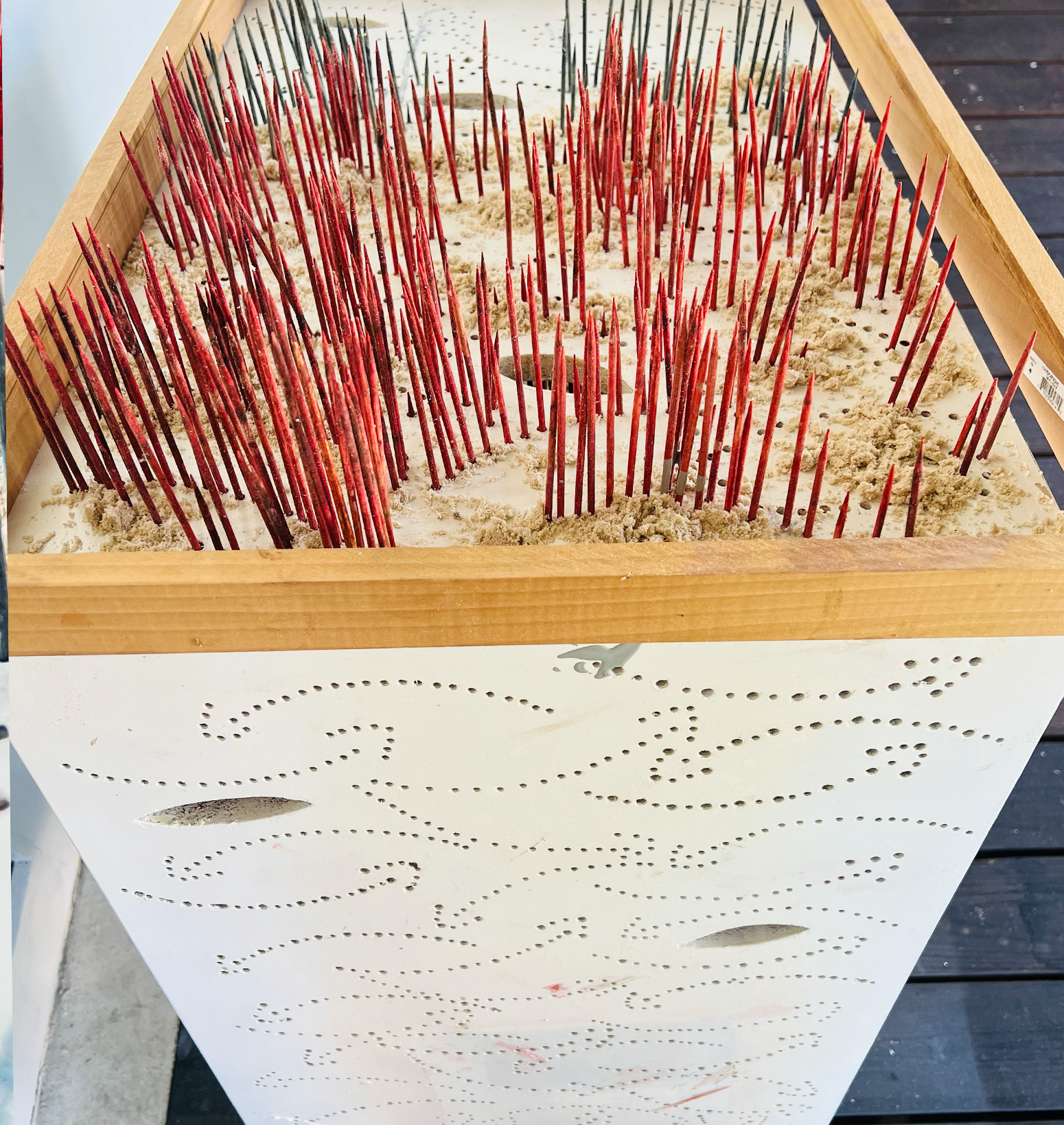 "Out for delivery" wood sculpture