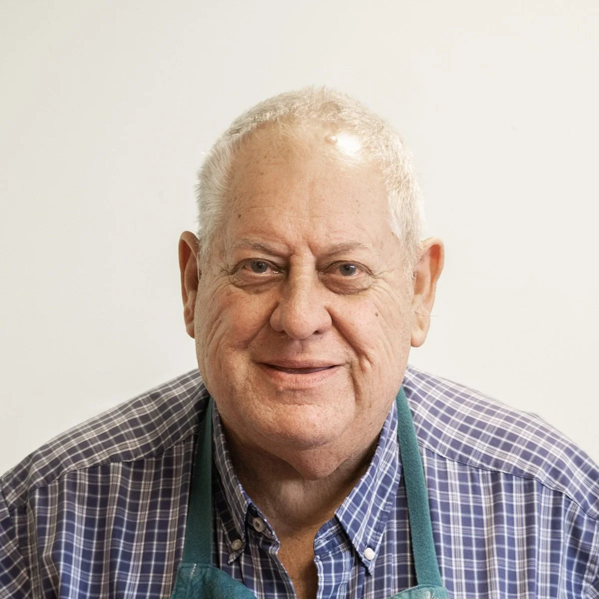 Derek Foxen, Treasure, Man waring green apron and check shirt