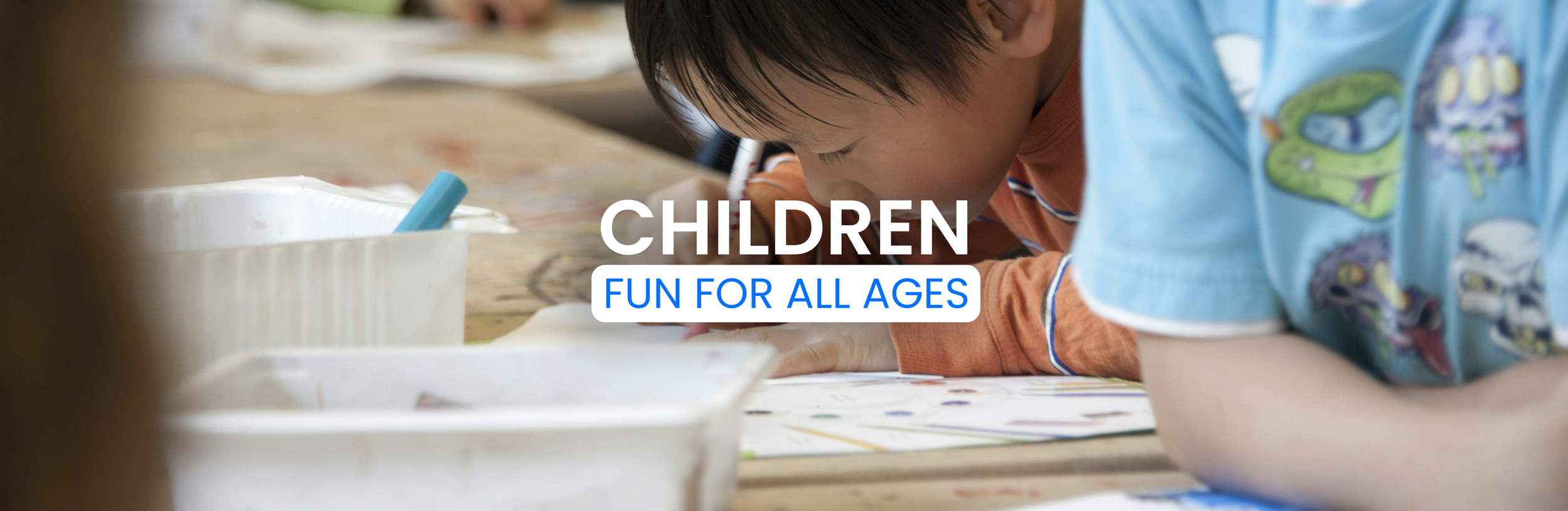 Children Fun For All Ages, group of diverse children doing an activity with pens 