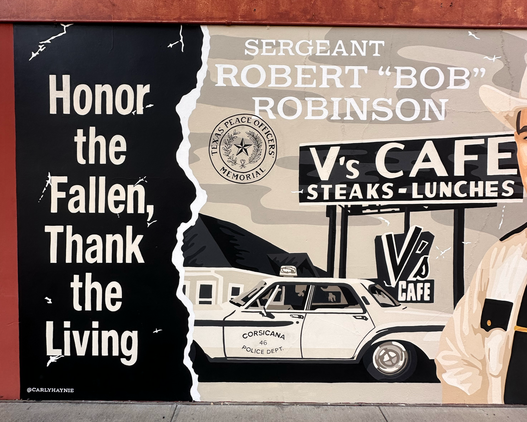 A mural commemorating Sgt. Robertson, a Texas peace officer. It features a police car, a badge, and a figure in uniform, with an inspirational quote: 'Honor the fallen. Thank the living.' The mural includes references to Texas peace officers and the 
