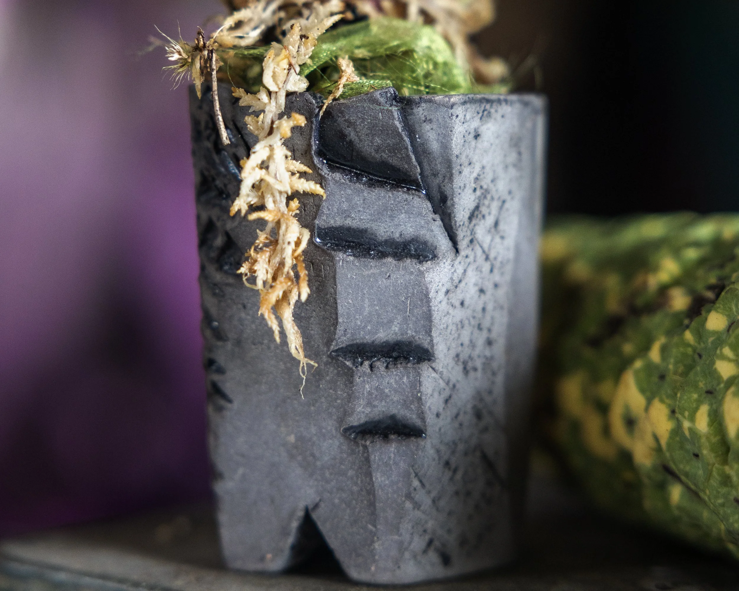 fragmented black clay