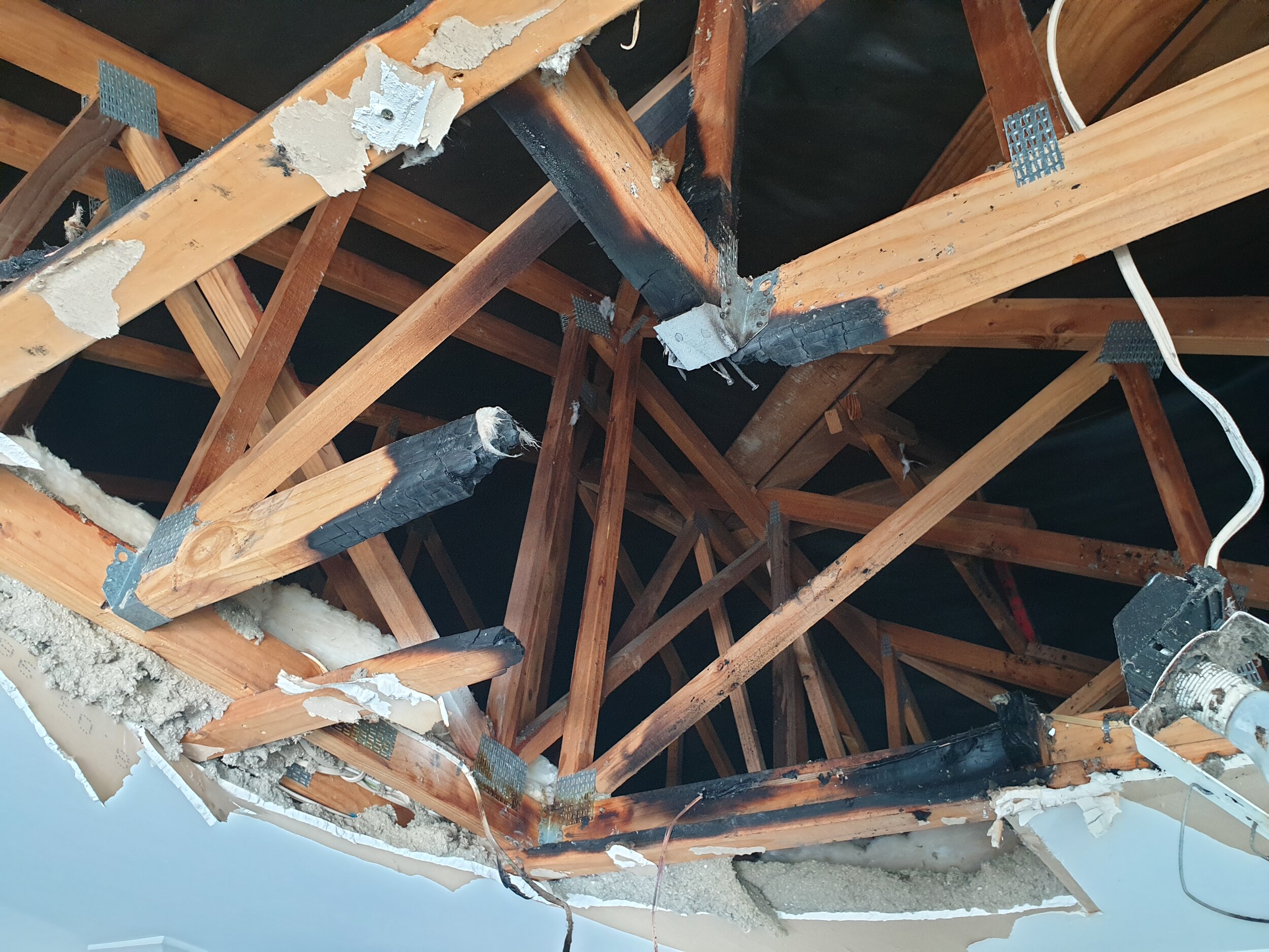 Resulting damage from an incorrectly installed downlight.