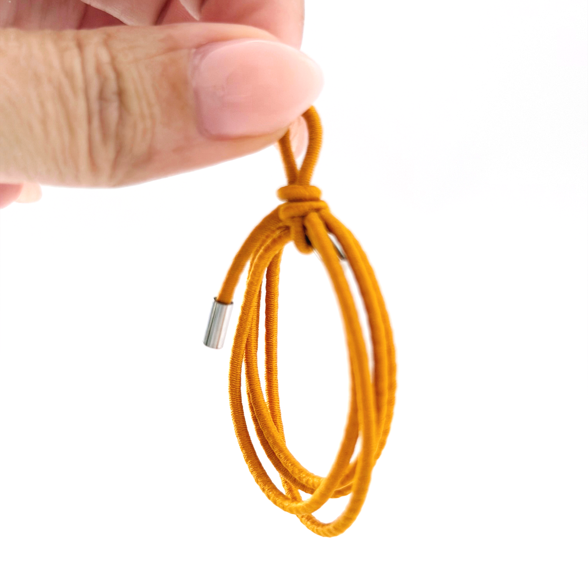 Mini utility rope shown next to fingertips for 1:12 scale size reference.