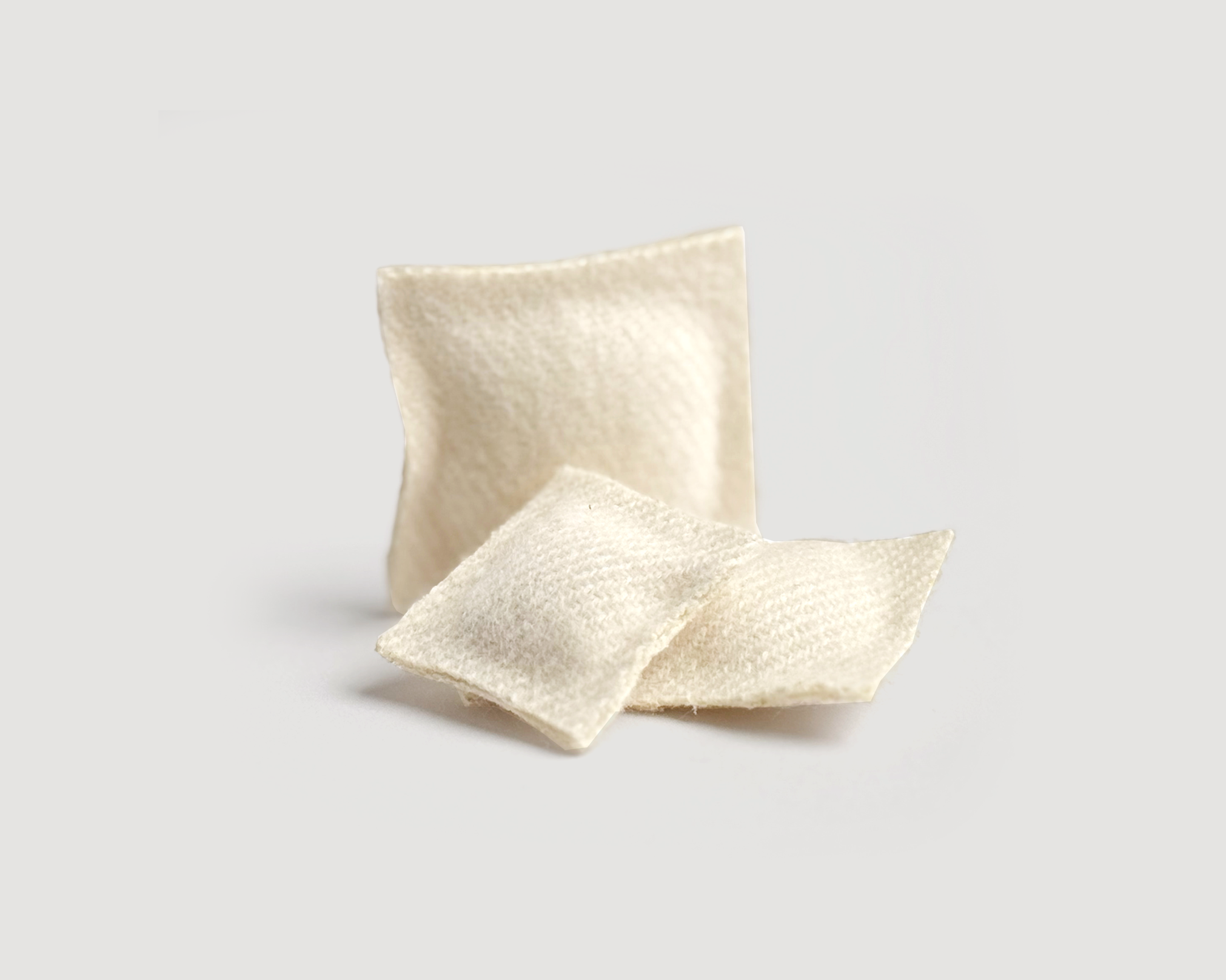 Set of 3 miniature dollhouse throw pillows in 1:12 scale. Handmade solid woven acrylic pillows in ivory.