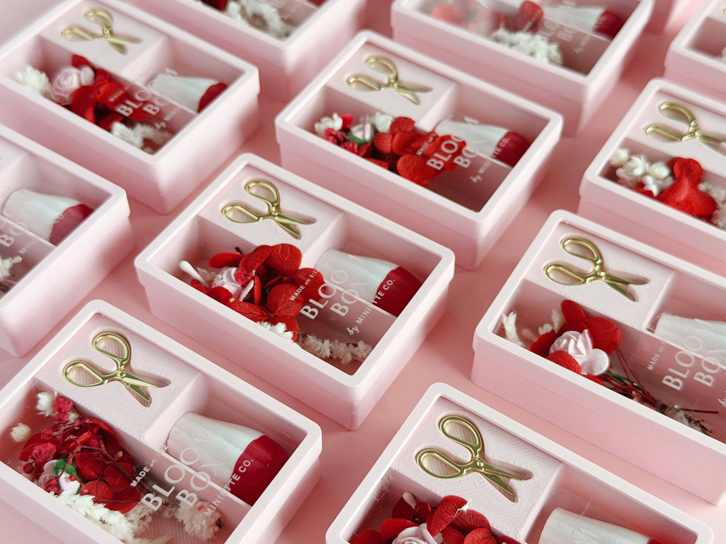 Valentine Bloom Box styled as dollhouse decor with miniature floral bouquet and vase