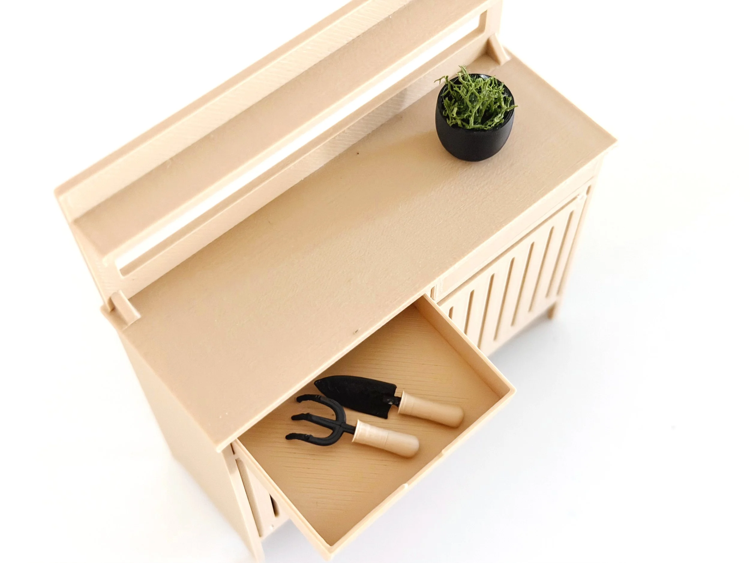 Miniature spade and cultivator designed to coordinate with Miniette’s Garden Tool Kit.