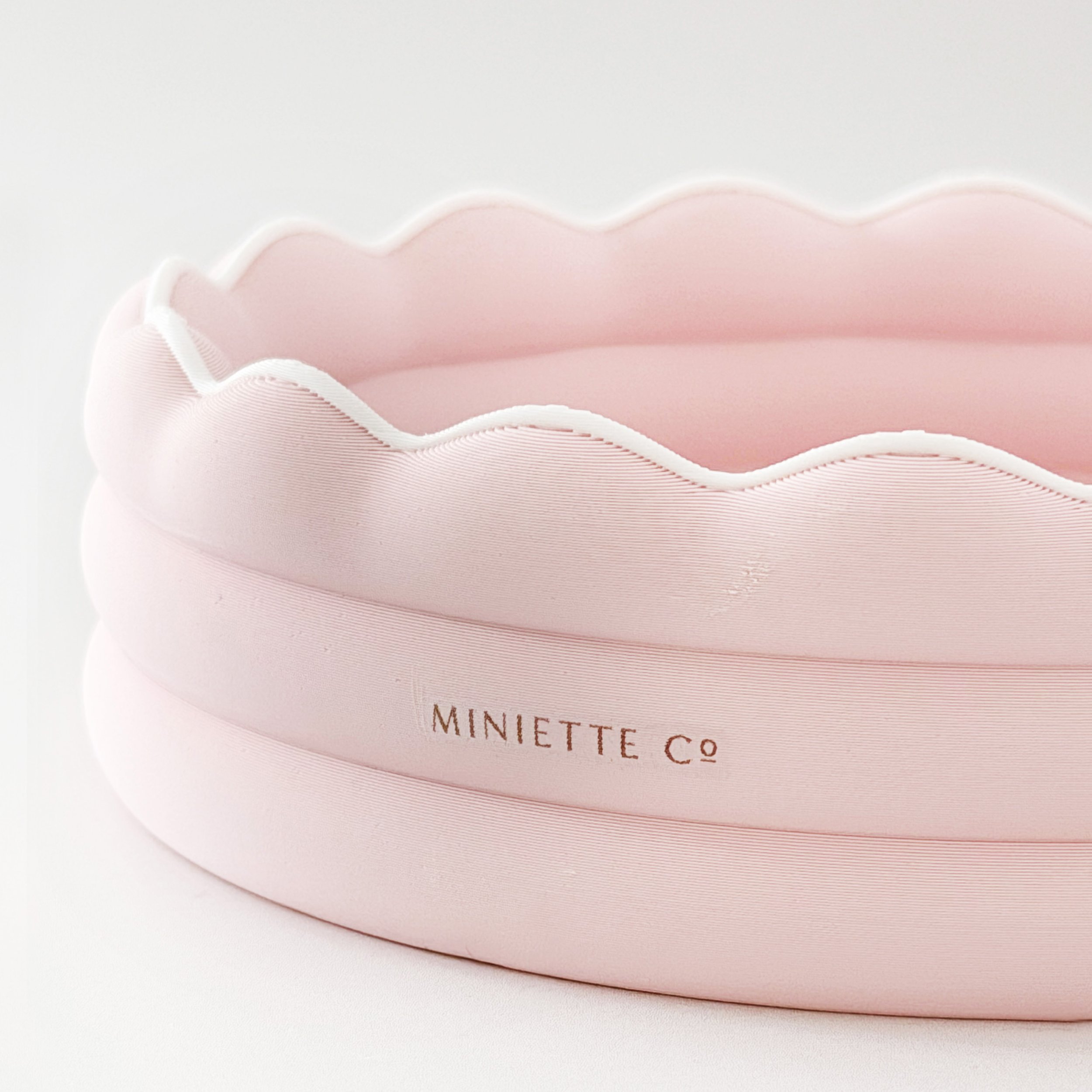 Modern 1:12 scale miniature kiddie pool on a white background.