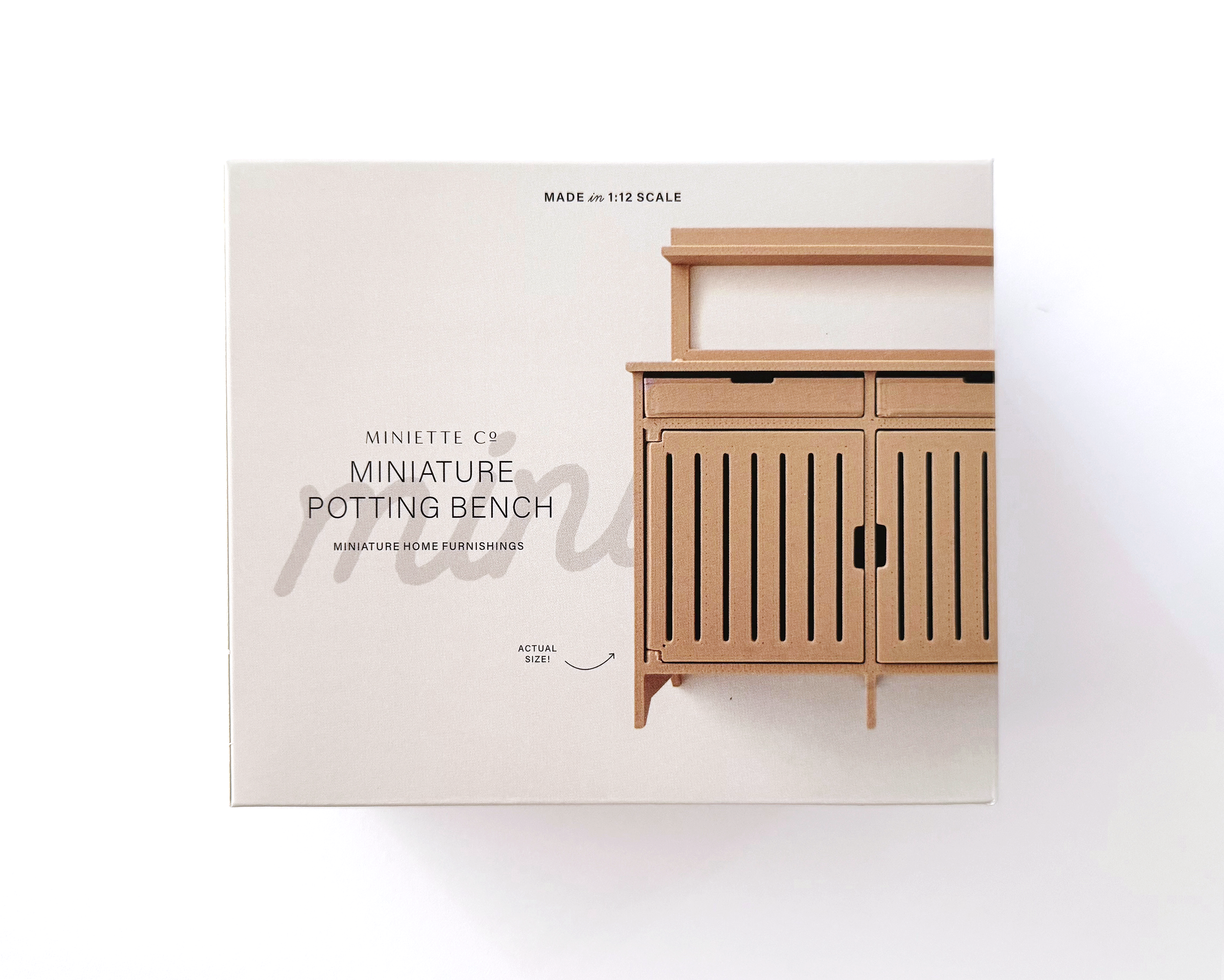 Gift-ready packaging of 1:12 scale miniature garden potting table and work bench