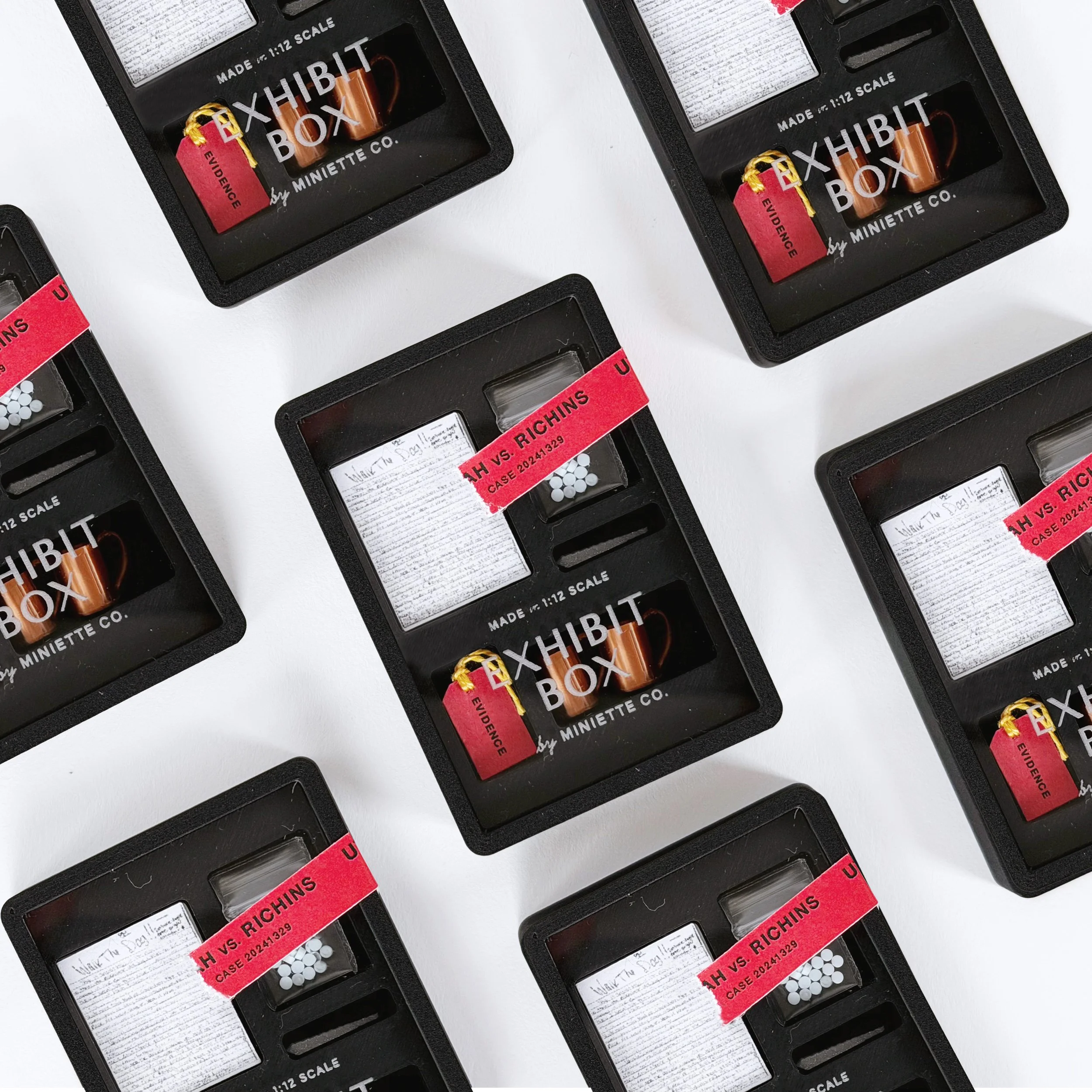 Clear acrylic miniature display box with etched lid and tiny evidence accessories inside, 1:12 scale collectible