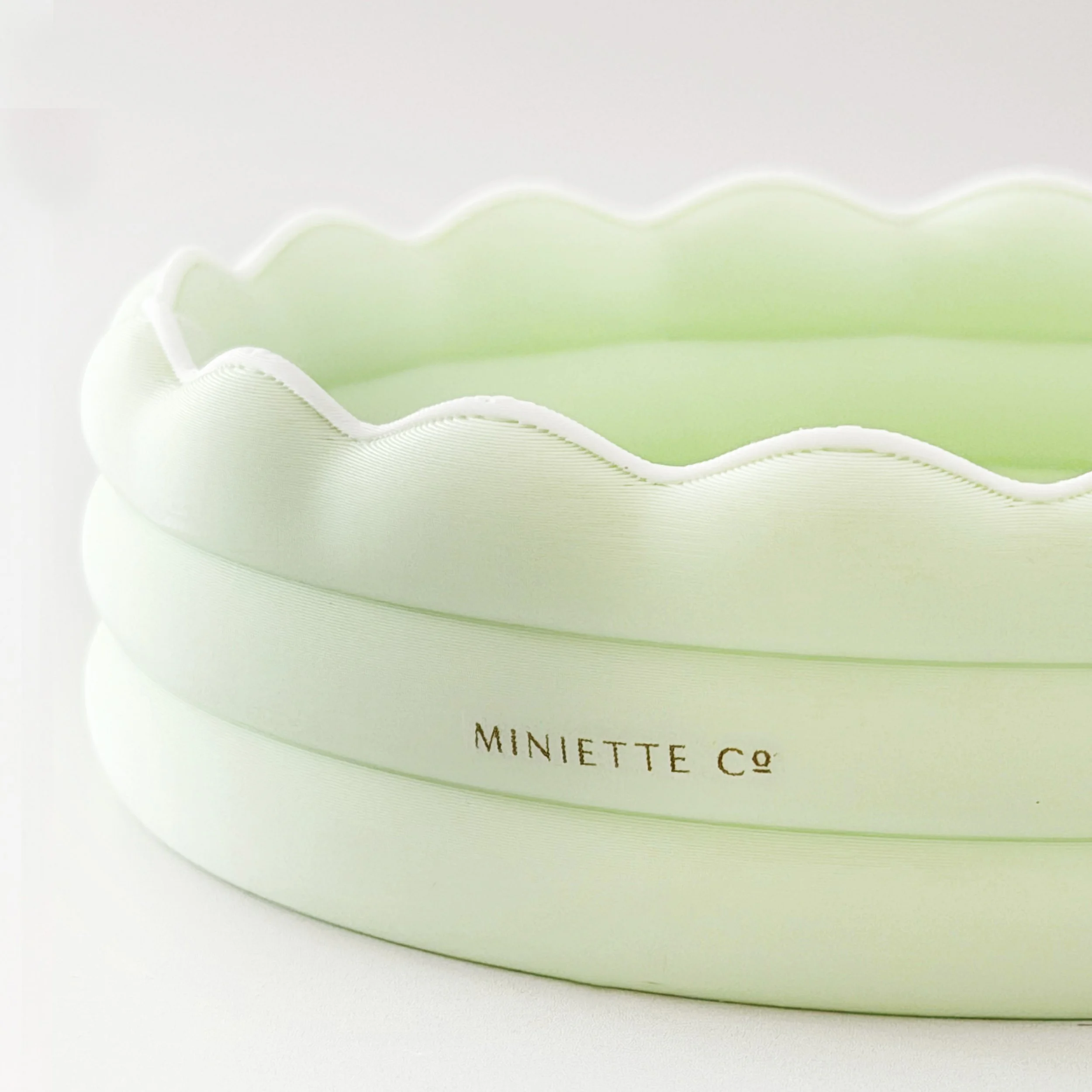 Modern 1:12 scale miniature kiddie pool on a white background.