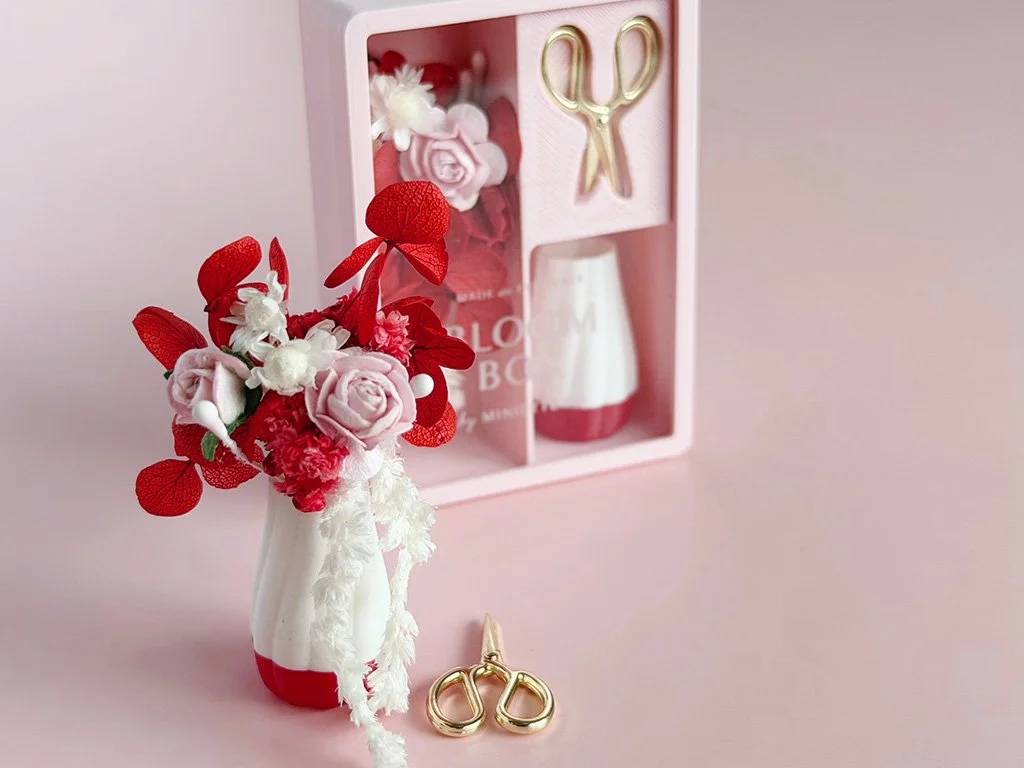 Miniature Valentine floral bouquet with coordinating vase and gold scissors, packaged in a pink gift box