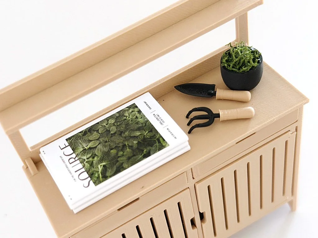 Miniature black moss bowl with bright green faux moss