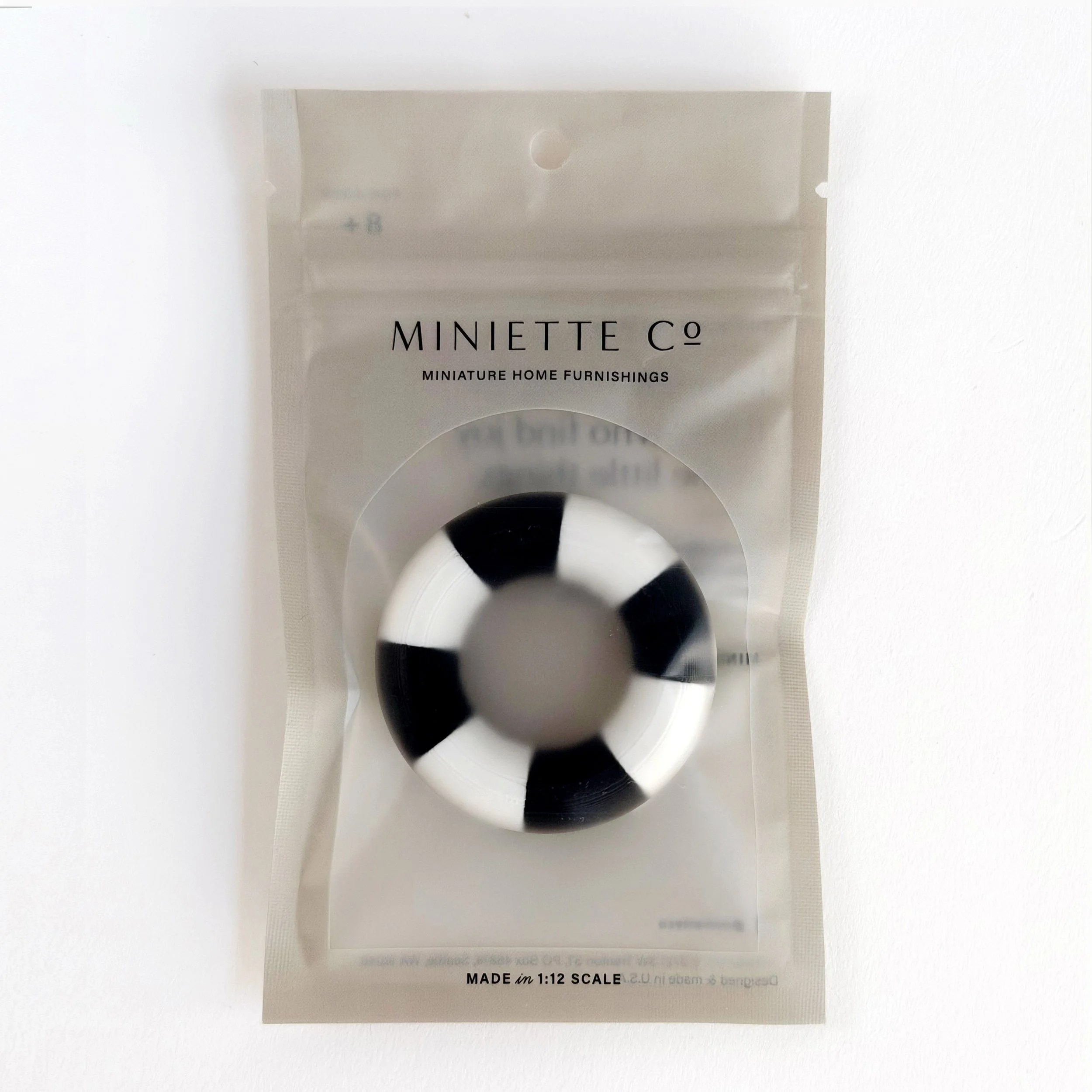 1:12 scale inflatable-style pool float miniature in modern classic color palette