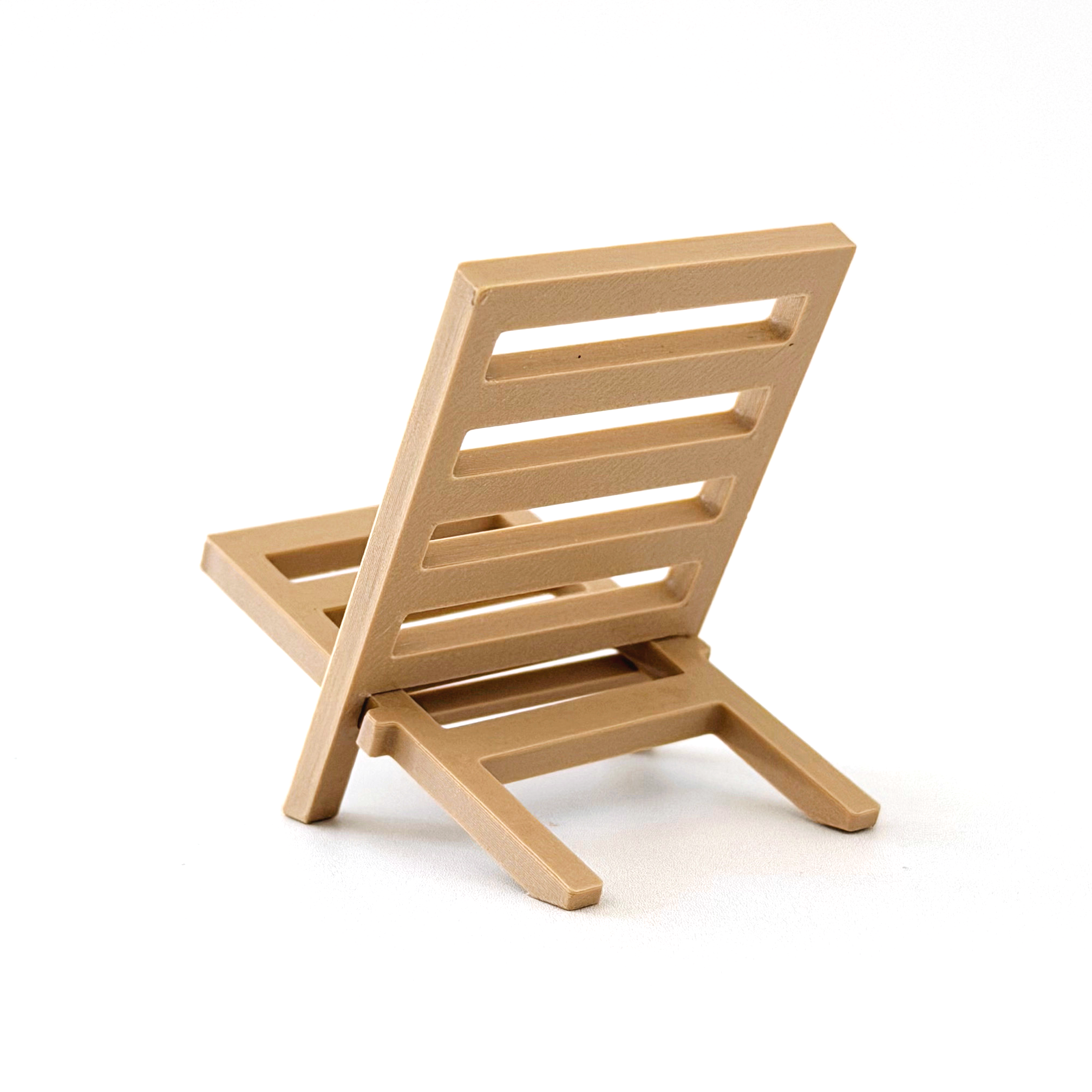 Close-up of a miniature camping chair with modern design.