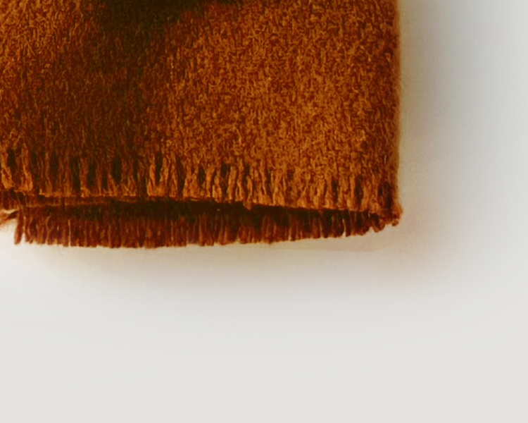 Miniature throw blanket for dollhouse furniture. Cozy 1:12 scale woven blanket with fringe, handmade in ivory, terra cotta, or royal currant acrylic fabric.