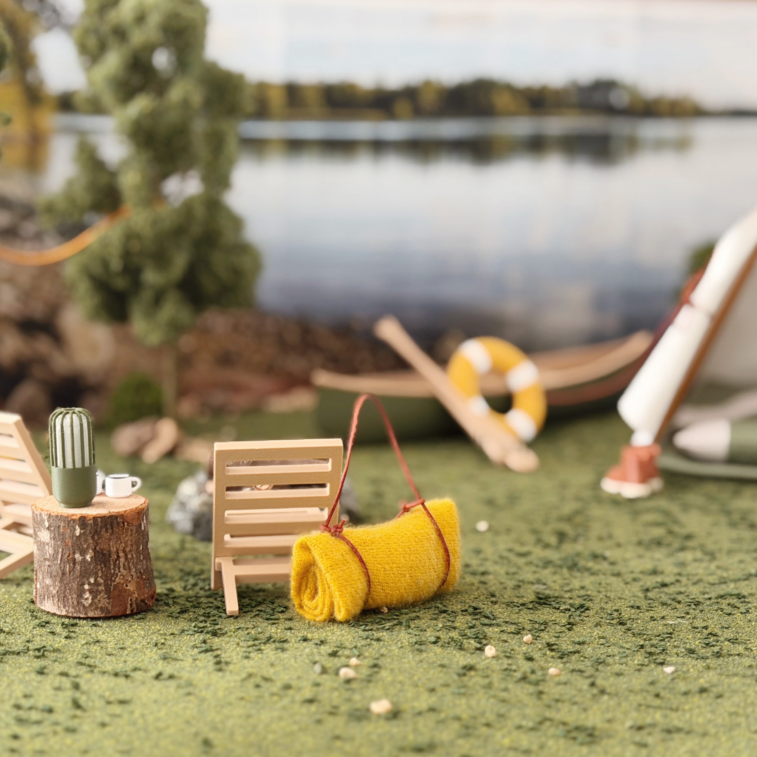 Modern dollhouse camp chair paired with miniature outdoor accessories.