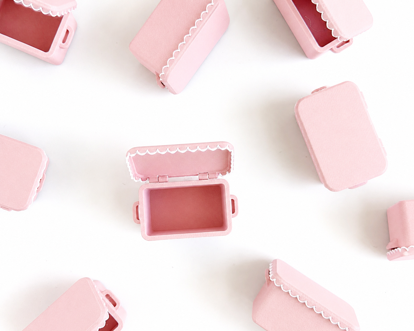 1:12 scale miniature bubblegum pink cooler with white lid on white background