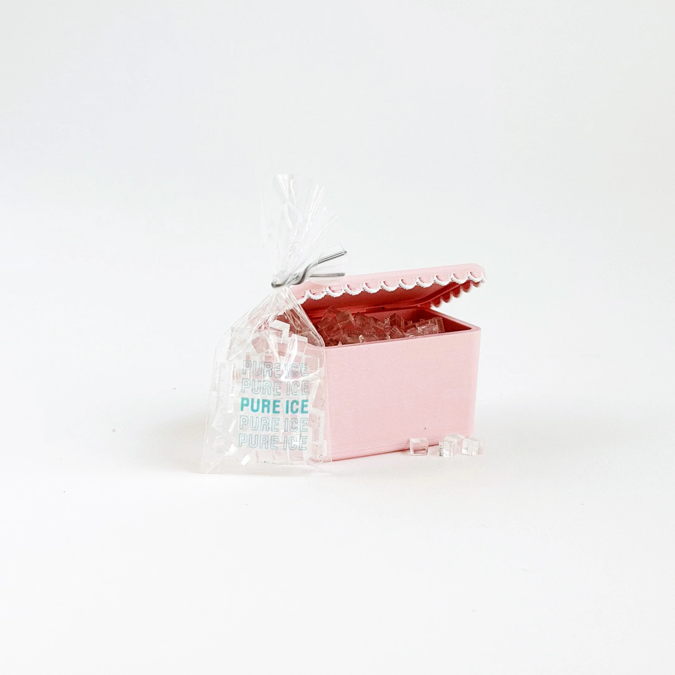 Miniature camping cooler in pink with realistic proportions