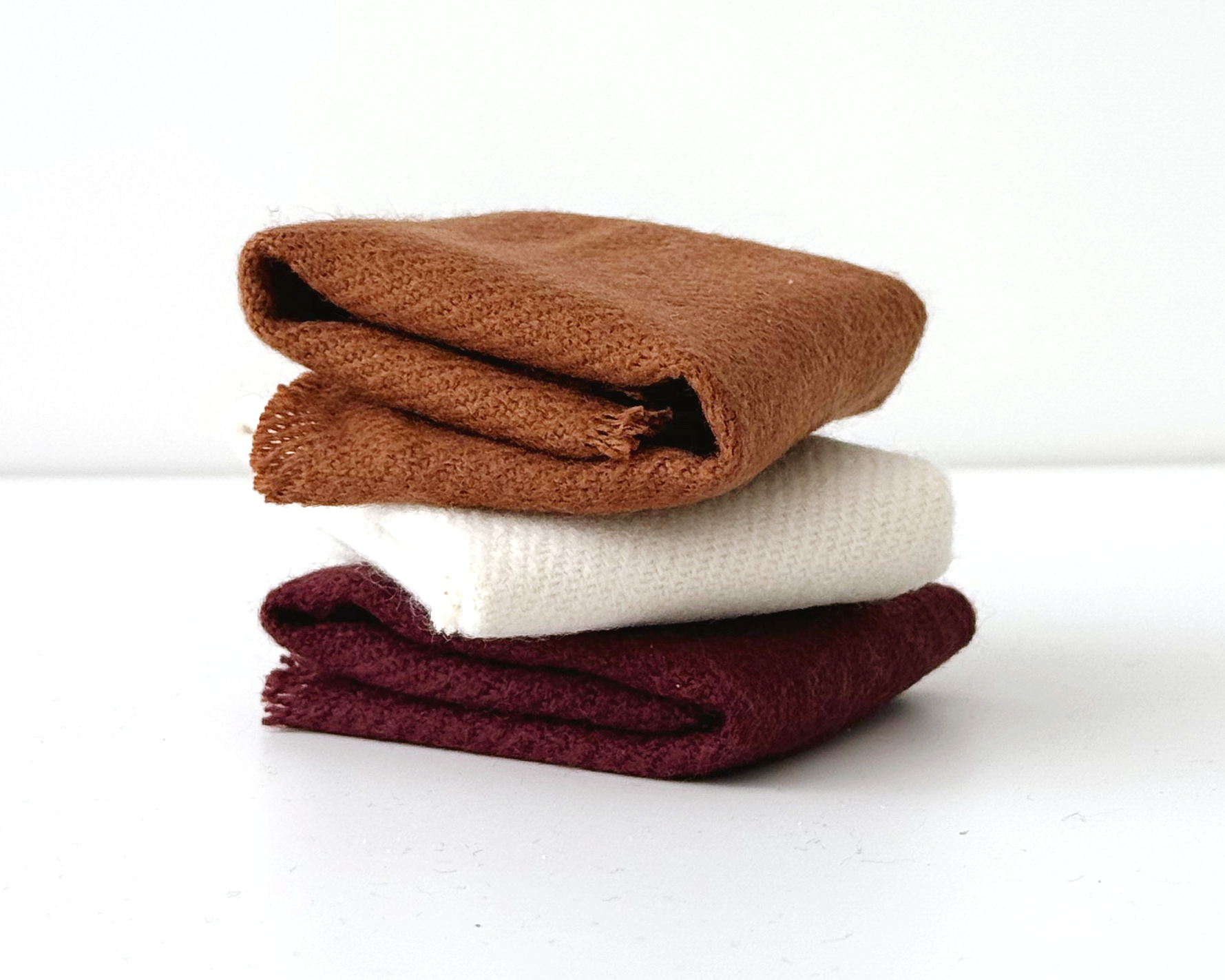 Miniature throw blanket for dollhouse furniture. Cozy 1:12 scale woven blanket with fringe, handmade in ivory, terra cotta, or royal currant acrylic fabric. (Copy)