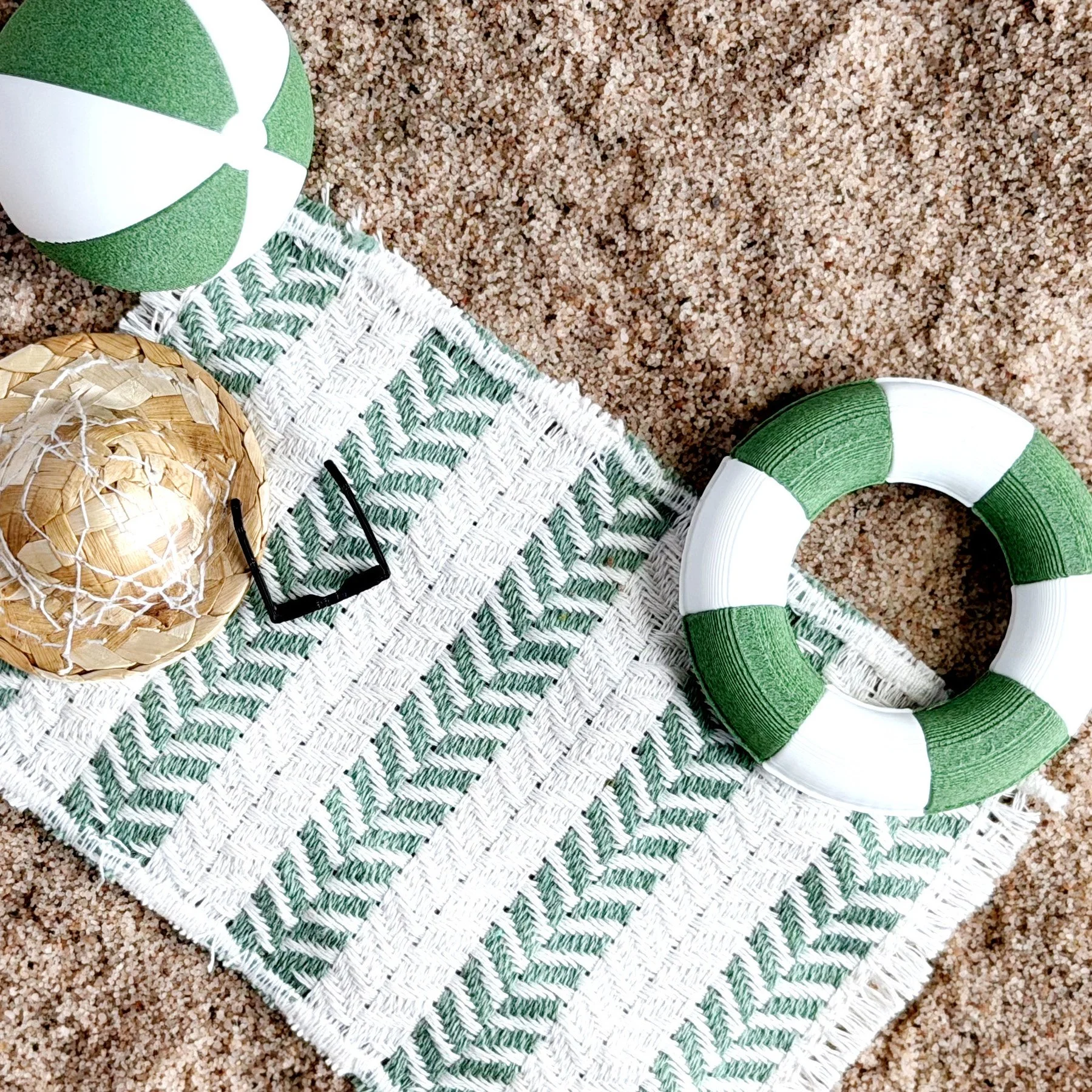 1:12 scale summer accessories styled in a clean, minimal layout