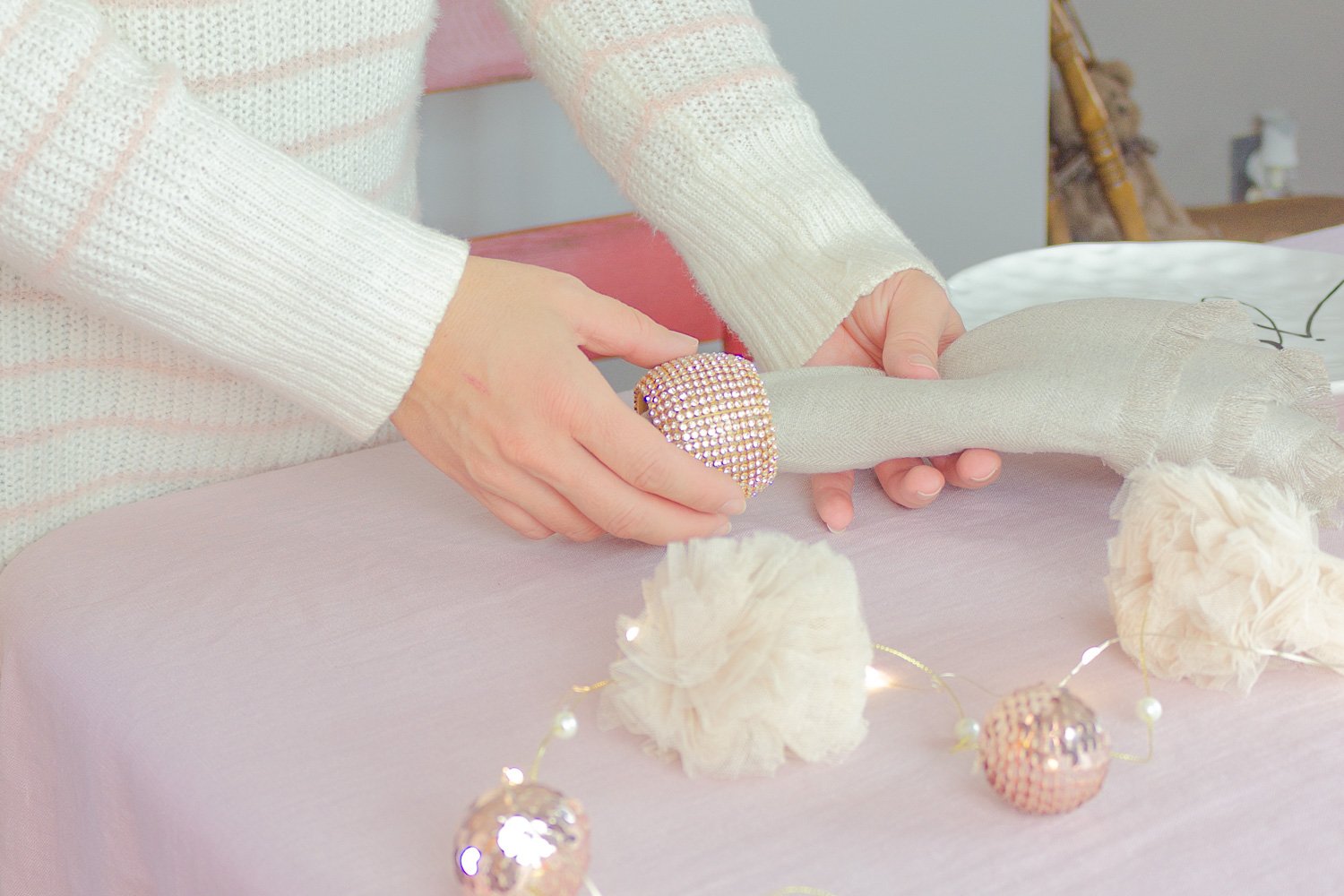 Adding a napkin ring to a linen napkin