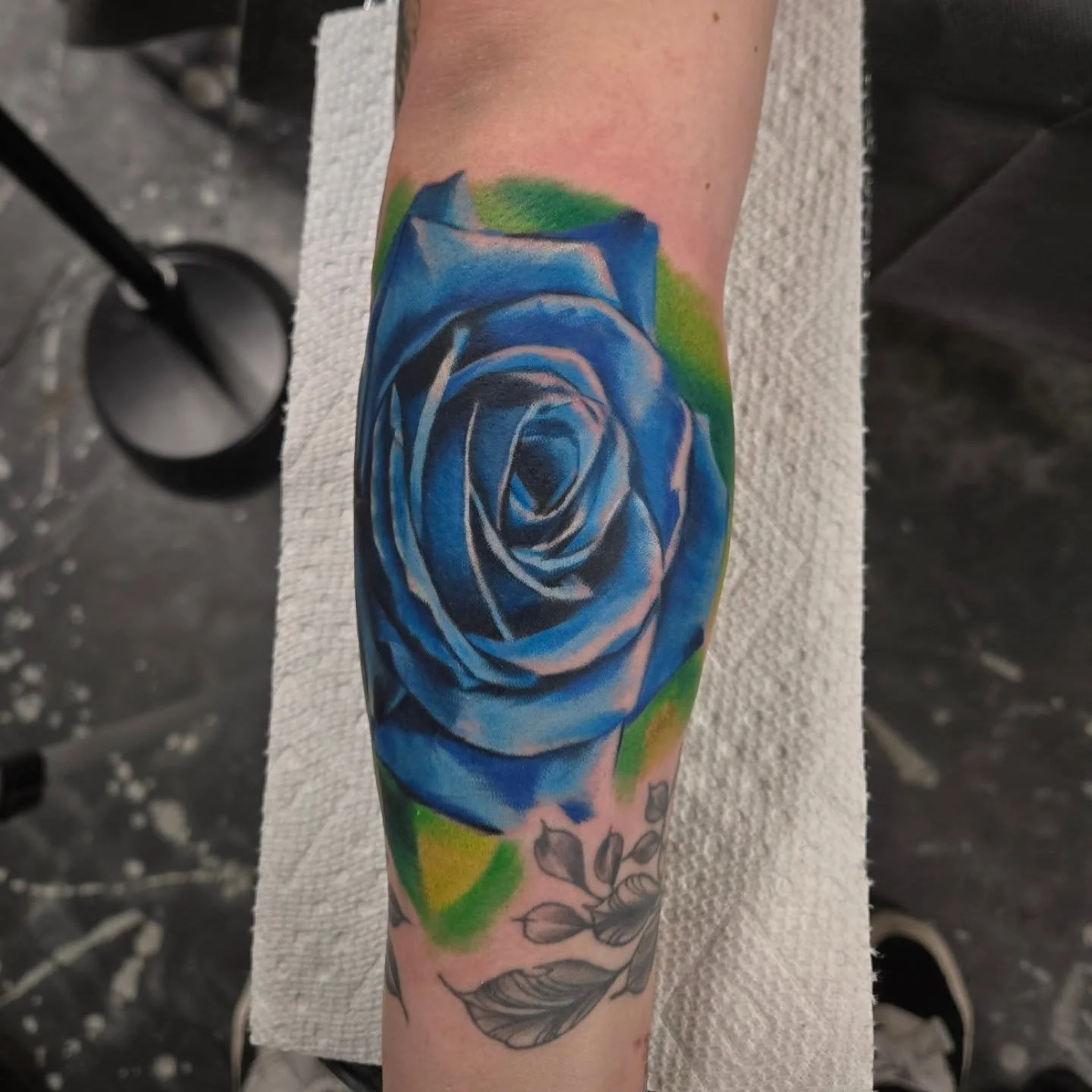 I've been doing alot of other styles of tattoos lately. I even did this full color rose last week. Used this rose to cover up some mountains and roman numerals. I always say I don't do color but all the oil paintings I've been doing have given me a m