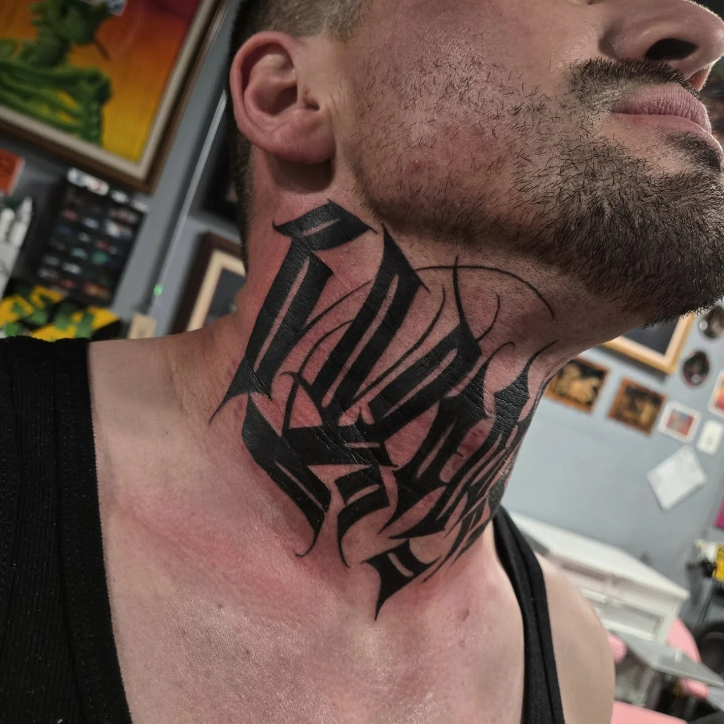 Did this abstract calligraphy neck tattoo over the weekend. Thanks again @papi_chiludo_ for coming through again and for sitting tough for this one. Not a fun spot to get tattooed but helps me alot when they sit good since its a pretty tough area to 