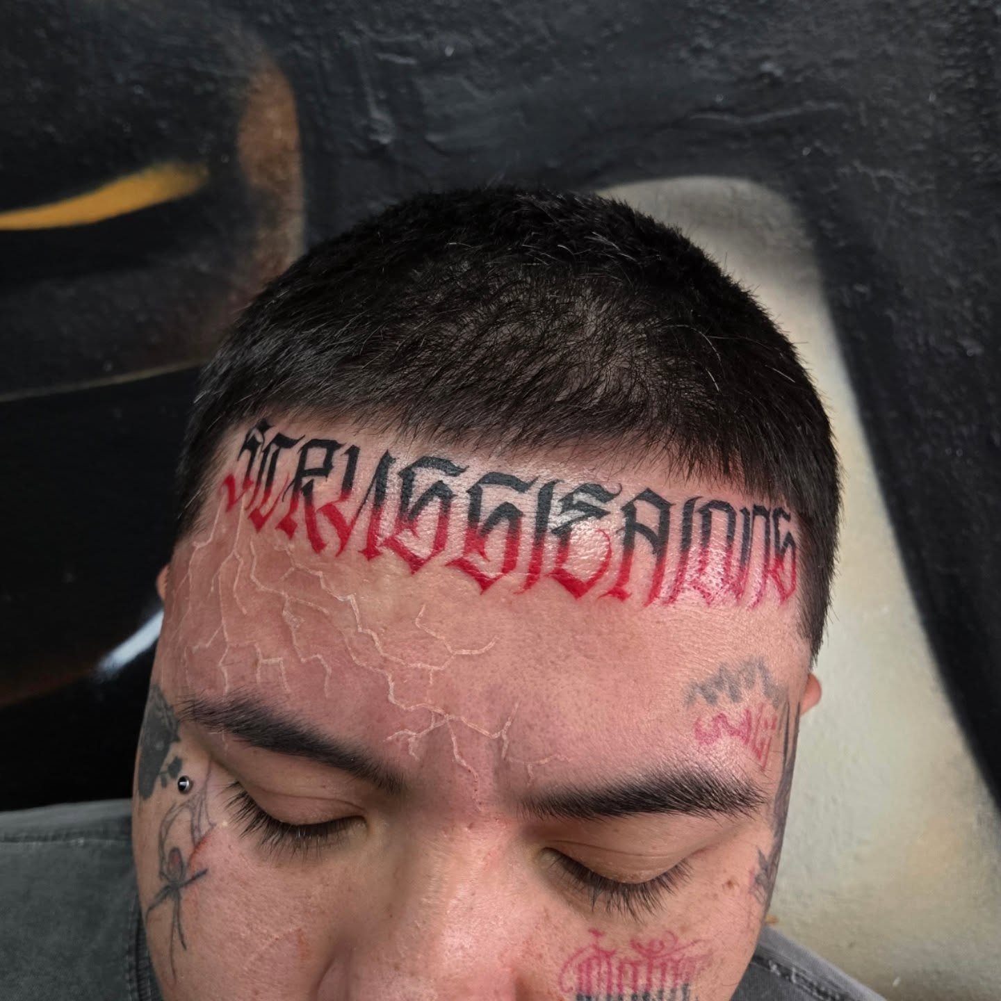 "Struggle Along" forehead letters with some color. 
Im booking aprip and may, dm me or email me at Aaron@diaztattoos.com to book your next tattoo. Lettering black and grey or color im down to do any style 🤘🏼