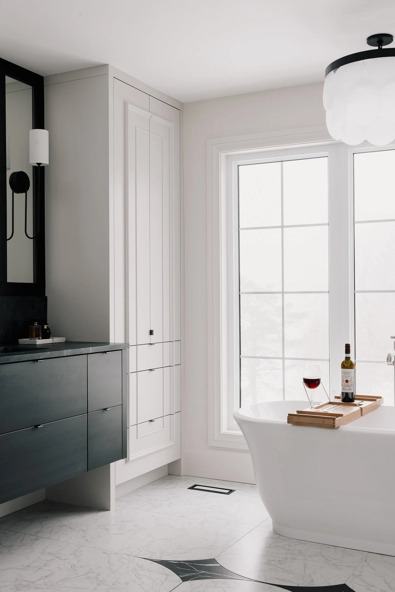 Thames Centre - Waubuno - Renovation - Elegant - Luxury - Floor Mounted Tub Filler - Ensuite - Custom Cabinetry - Natural Stone - Wall Mounted Faucet