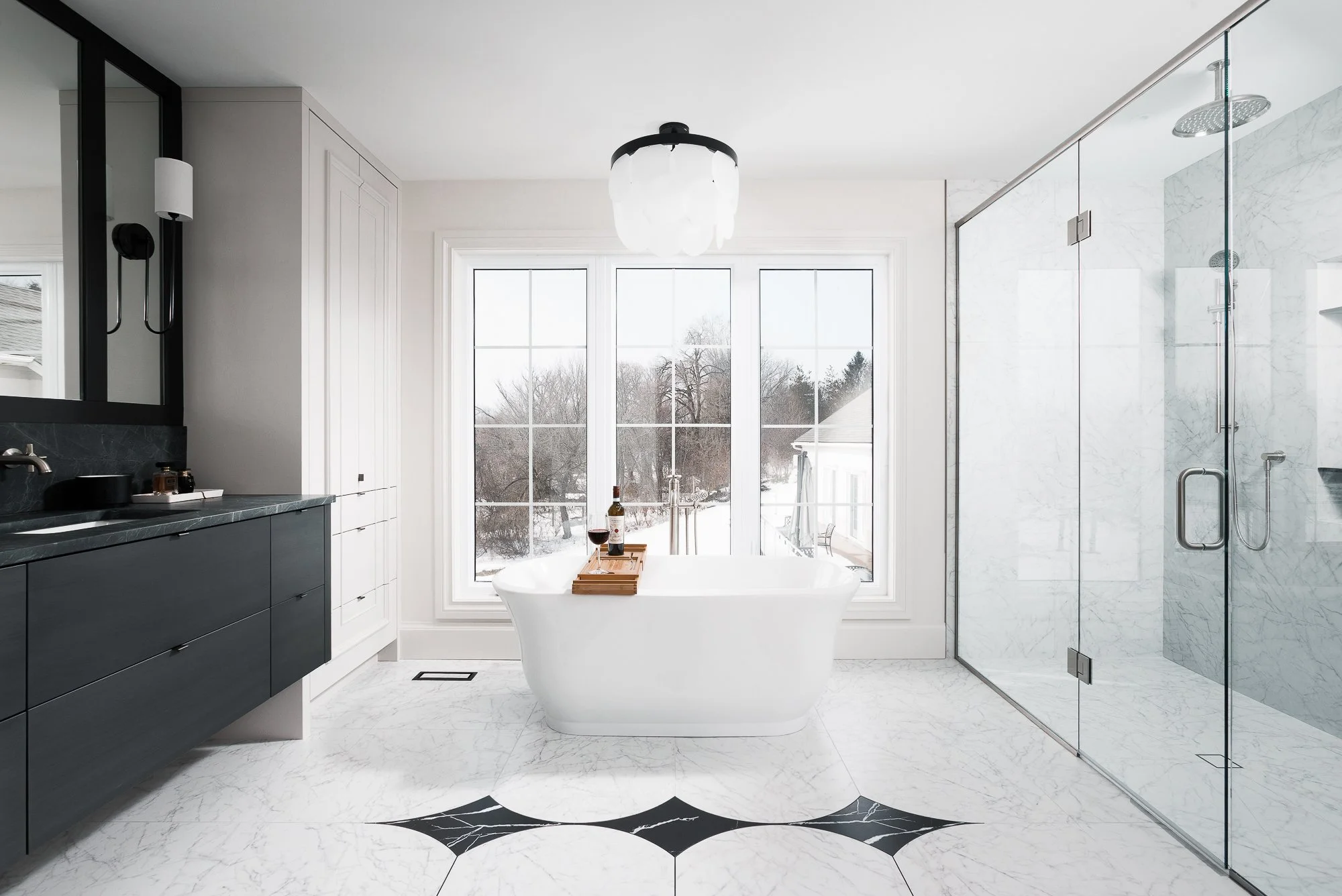 Thames Centre - Waubuno - Renovation - Elegant - Luxury - Ensuite - Floor Mounted Tub Filler - Ensuite - Custom Cabinetry - Natural Stone - Flush Shower