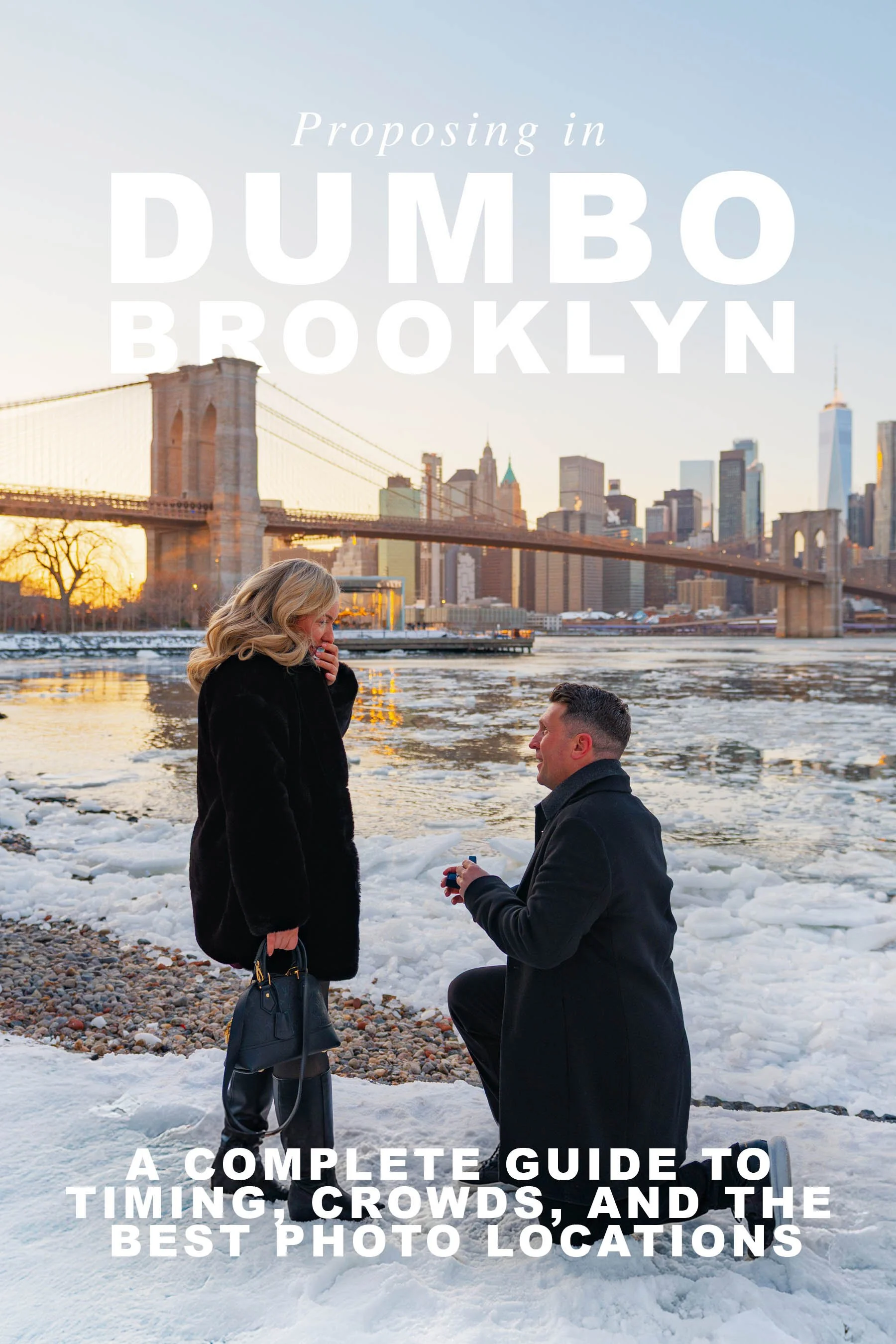 Snowy winter proposal on the DUMBO Brooklyn waterfront with the Manhattan skyline and bridge views