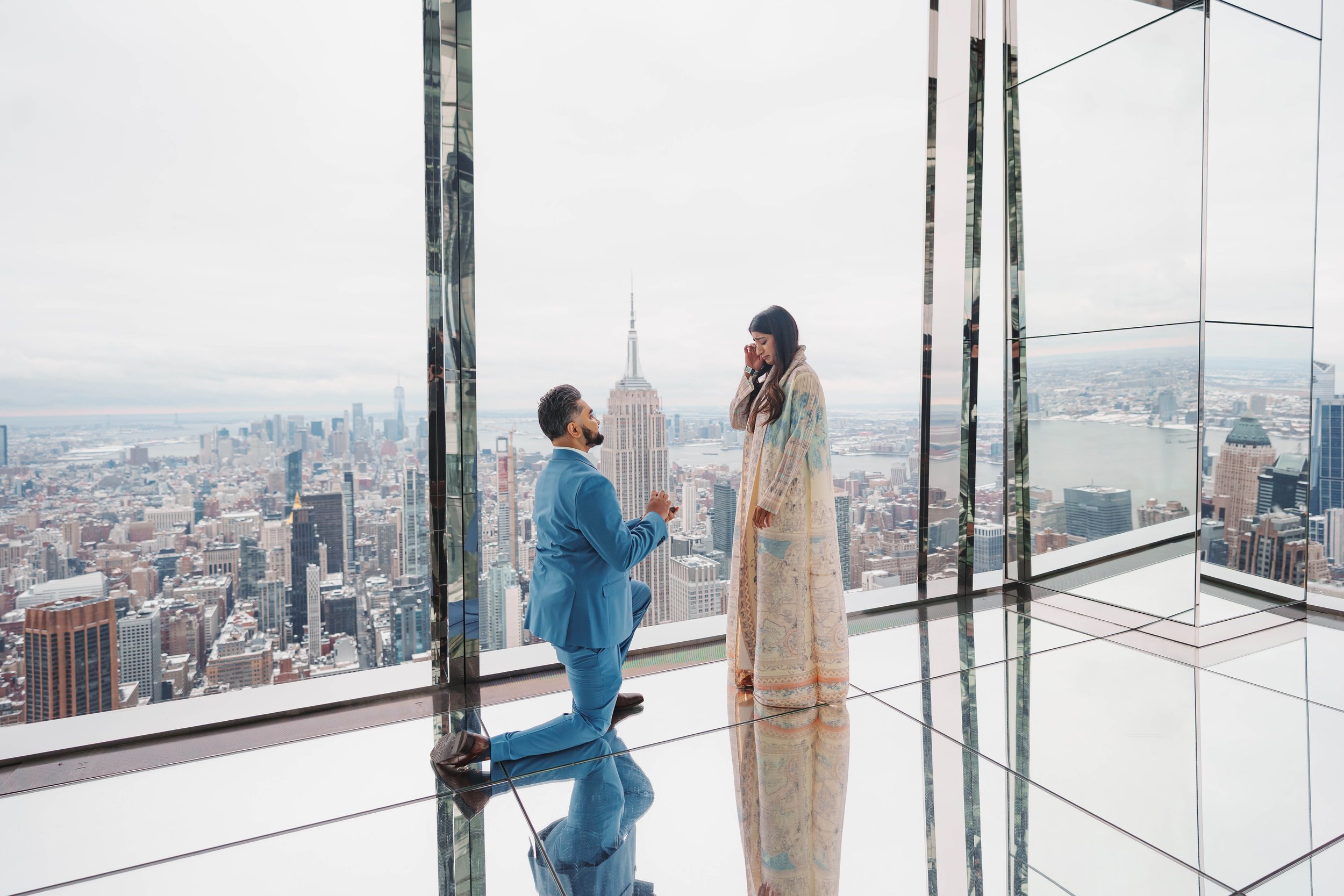 A beautiful marriage proposal and engagement photoshoot at SUMMIT One Vanderbilt in New York City captured by Matt Ritchie