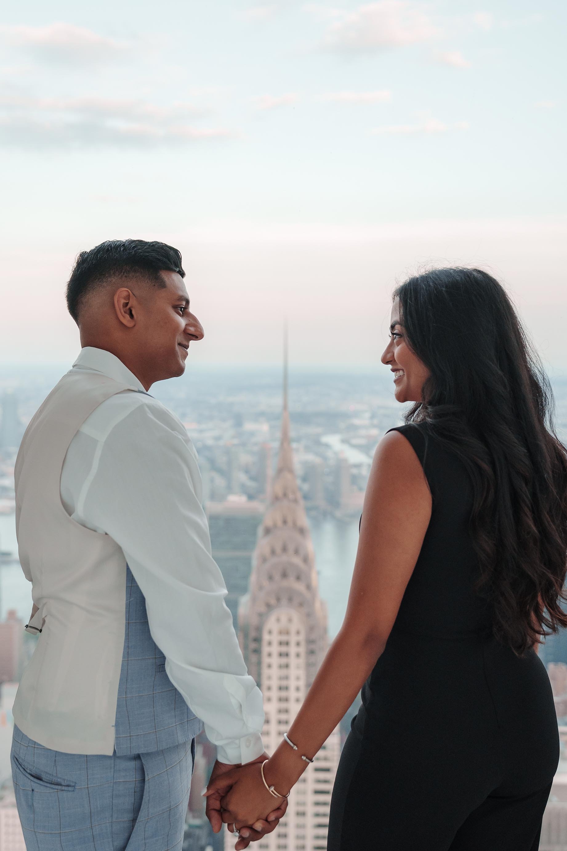 A beautiful marriage proposal and engagement photoshoot at SUMMIT One Vanderbilt in New York City captured by Matt Ritchie