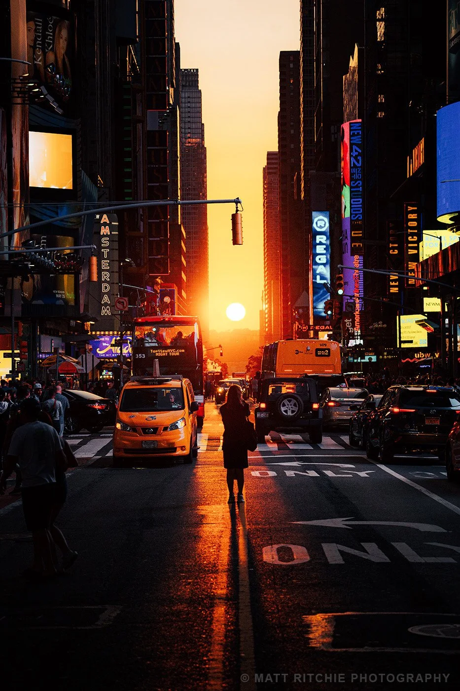manhattanhenge-nyc-sunset-42nd-street-taxi.jpg