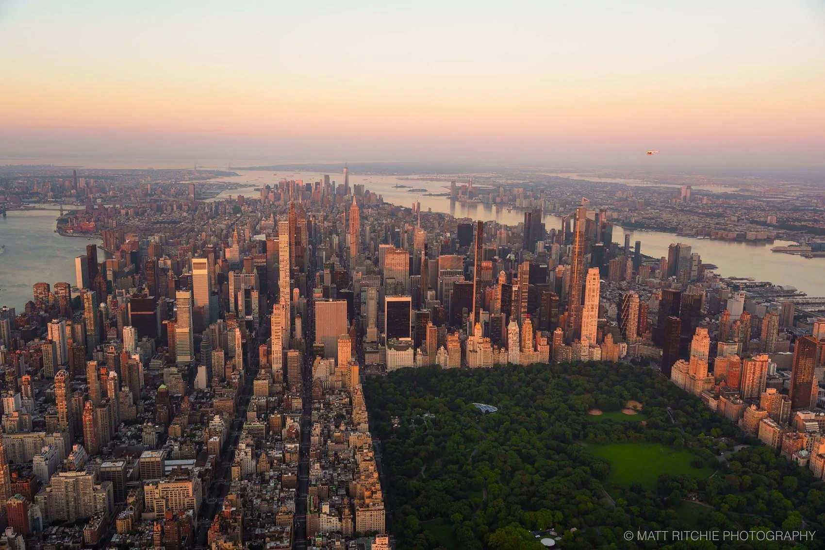 Central Park at sunrise viewed from a helicopter above Manhattan