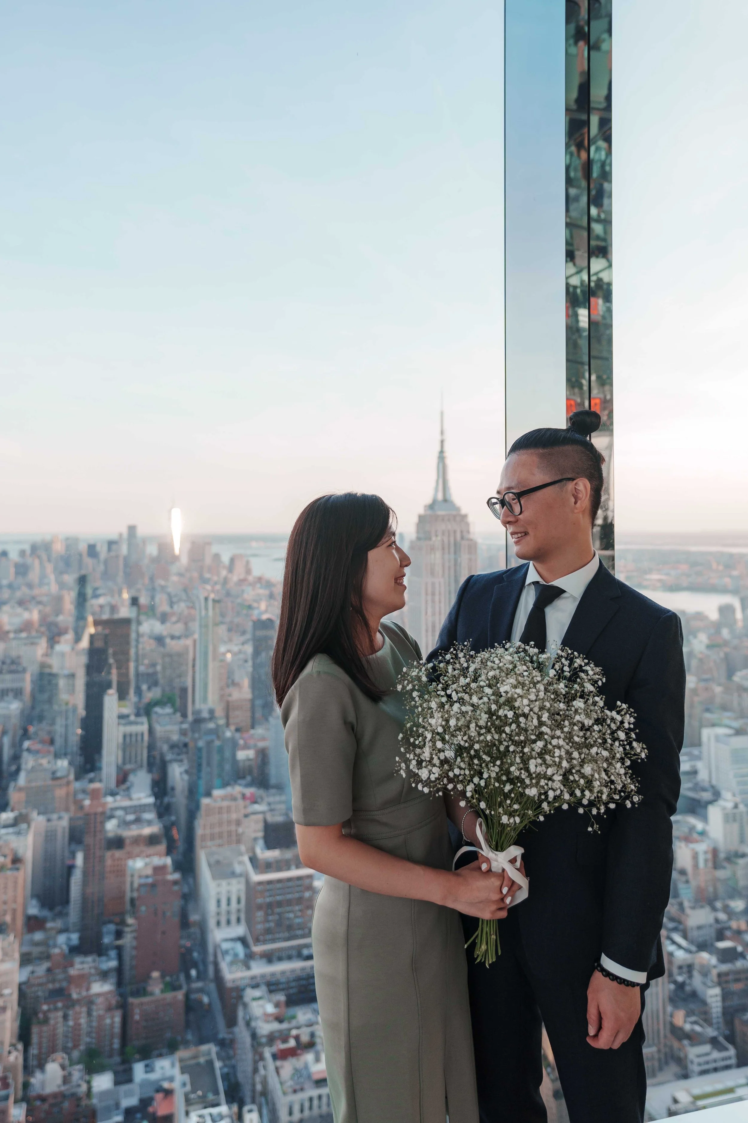 A beautiful marriage proposal and engagement photoshoot at SUMMIT One Vanderbilt in New York City captured by Matt Ritchie