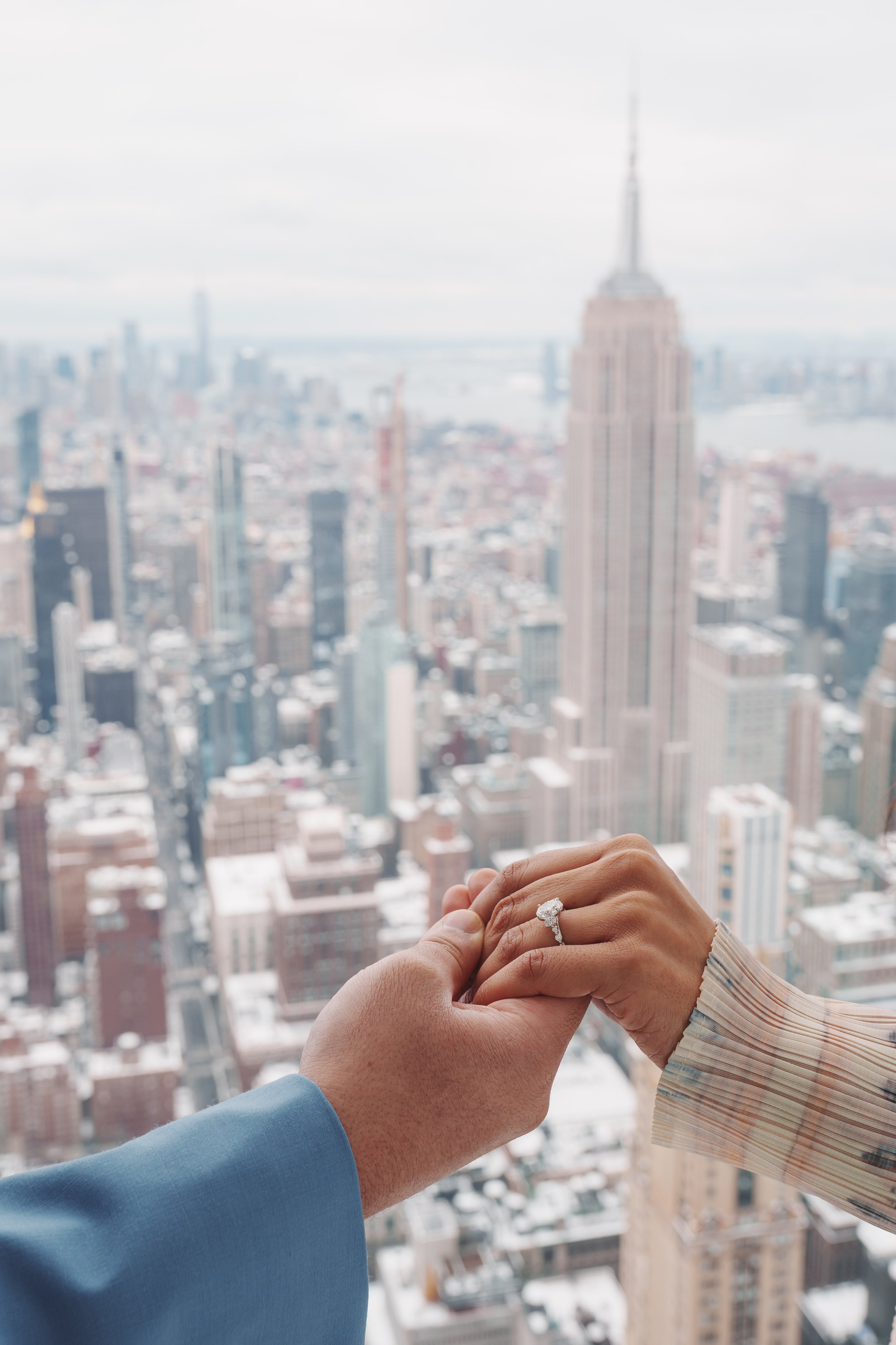 A beautiful marriage proposal and engagement photoshoot at SUMMIT One Vanderbilt in New York City captured by Matt Ritchie
