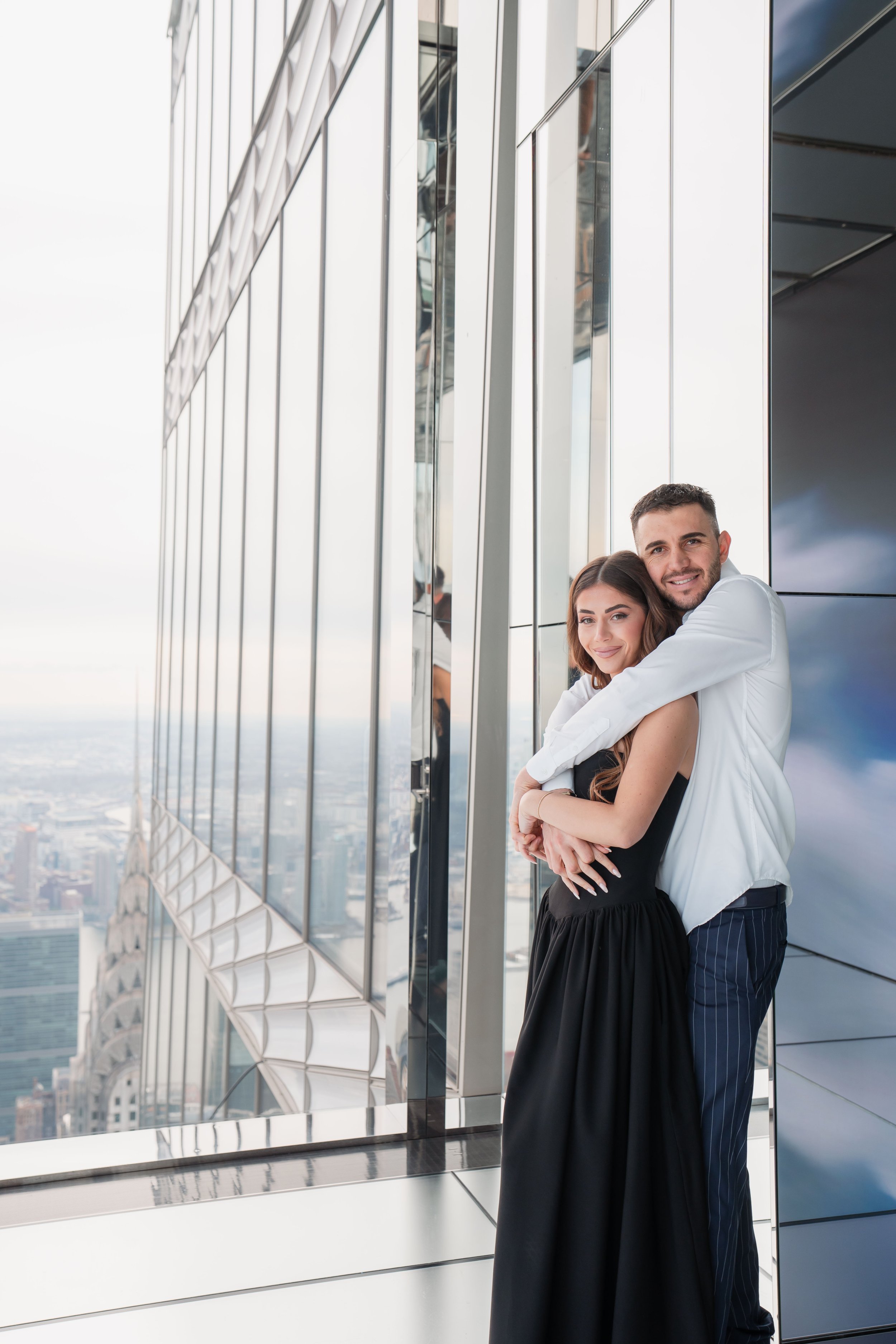 A beautiful marriage proposal and engagement photoshoot at SUMMIT One Vanderbilt in New York City captured by Matt Ritchie