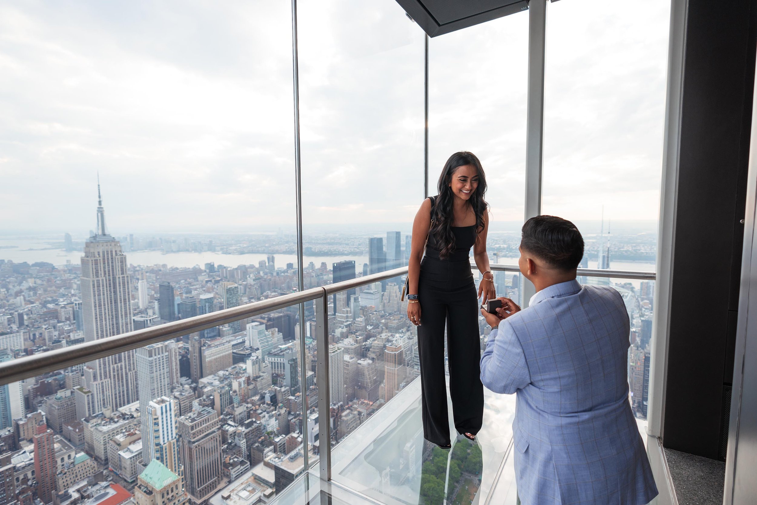 A beautiful marriage proposal and engagement photoshoot at SUMMIT One Vanderbilt in New York City captured by Matt Ritchie