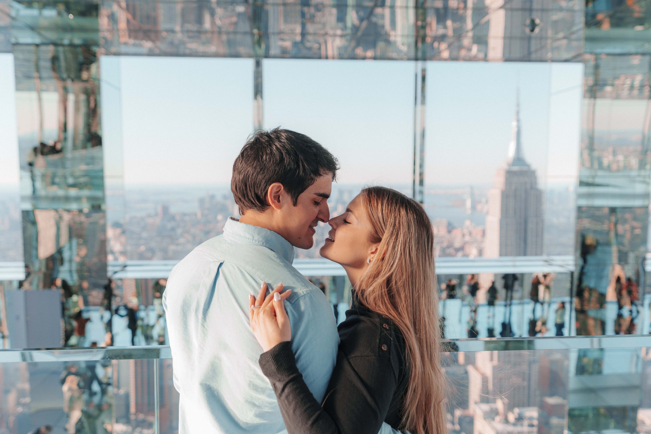 A beautiful marriage proposal and engagement photoshoot at SUMMIT One Vanderbilt in New York City captured by Matt Ritchie