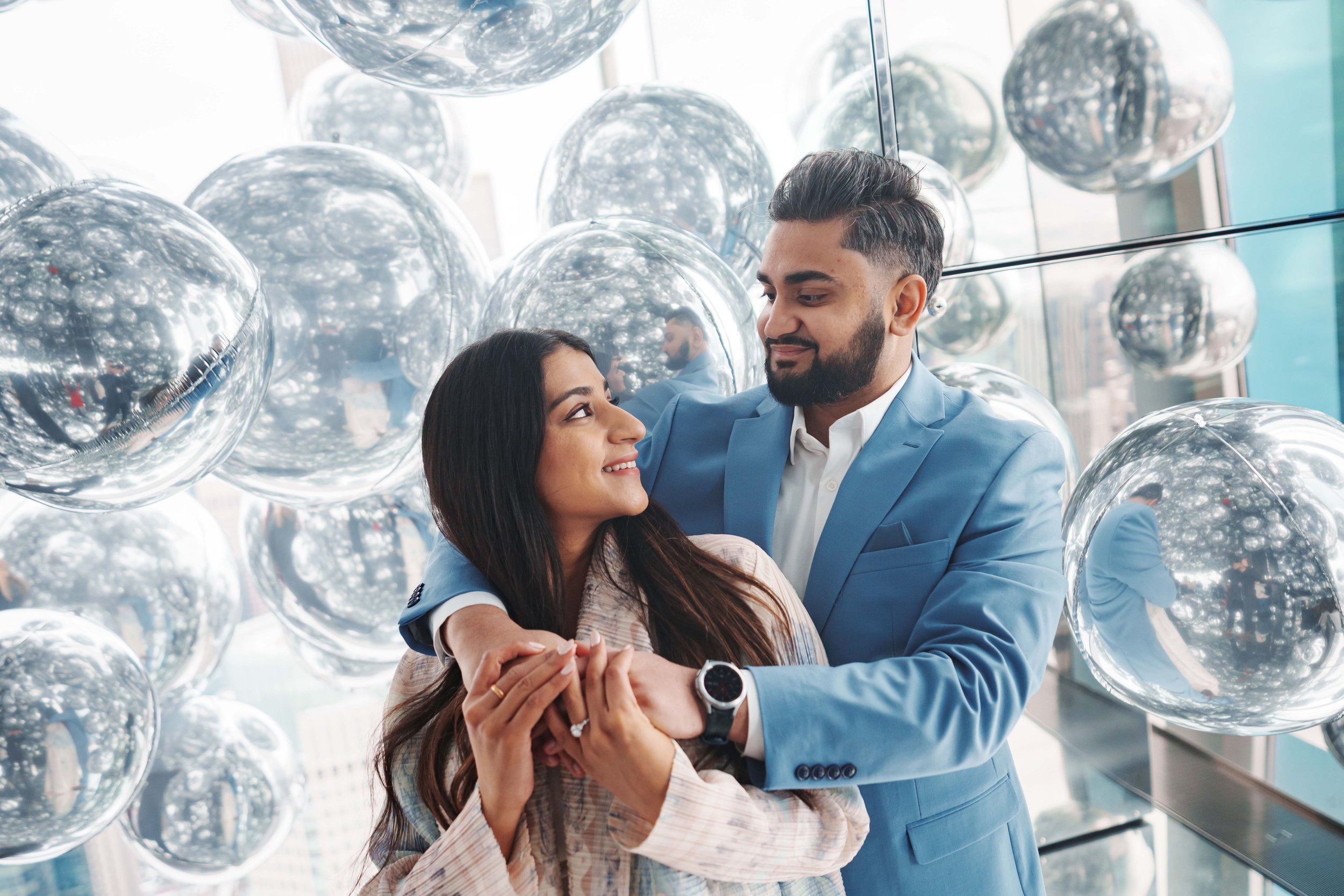 A beautiful marriage proposal and engagement photoshoot at SUMMIT One Vanderbilt in New York City captured by Matt Ritchie