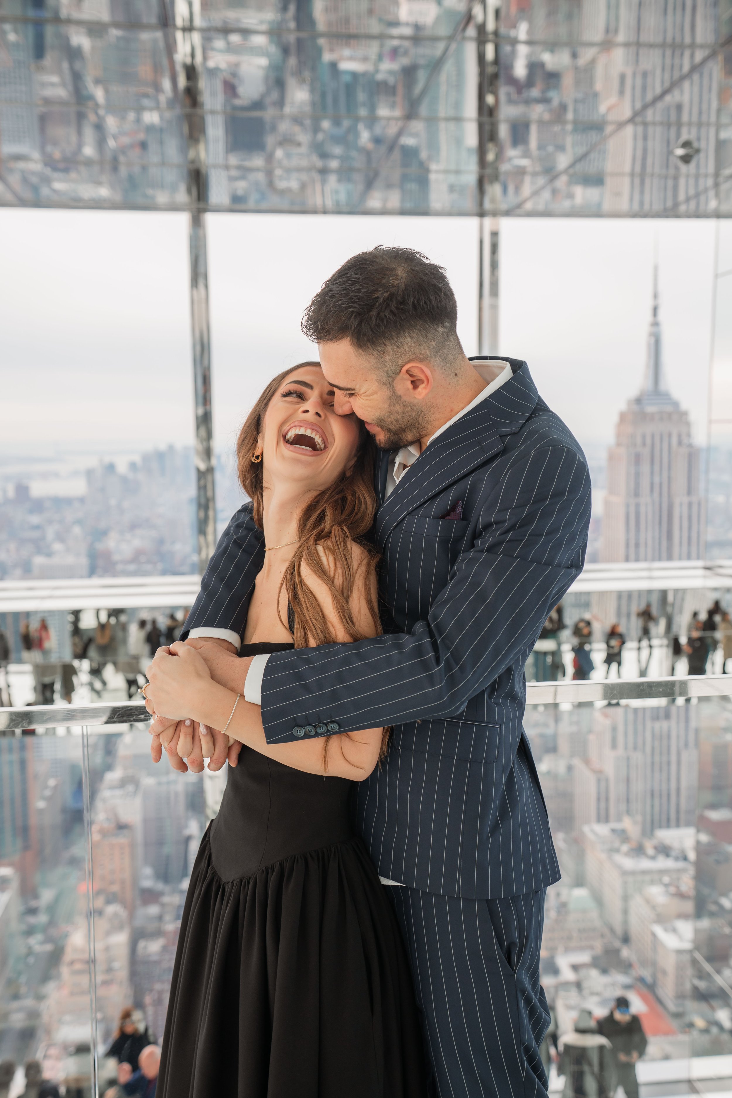 A beautiful marriage proposal and engagement photoshoot at SUMMIT One Vanderbilt in New York City captured by Matt Ritchie