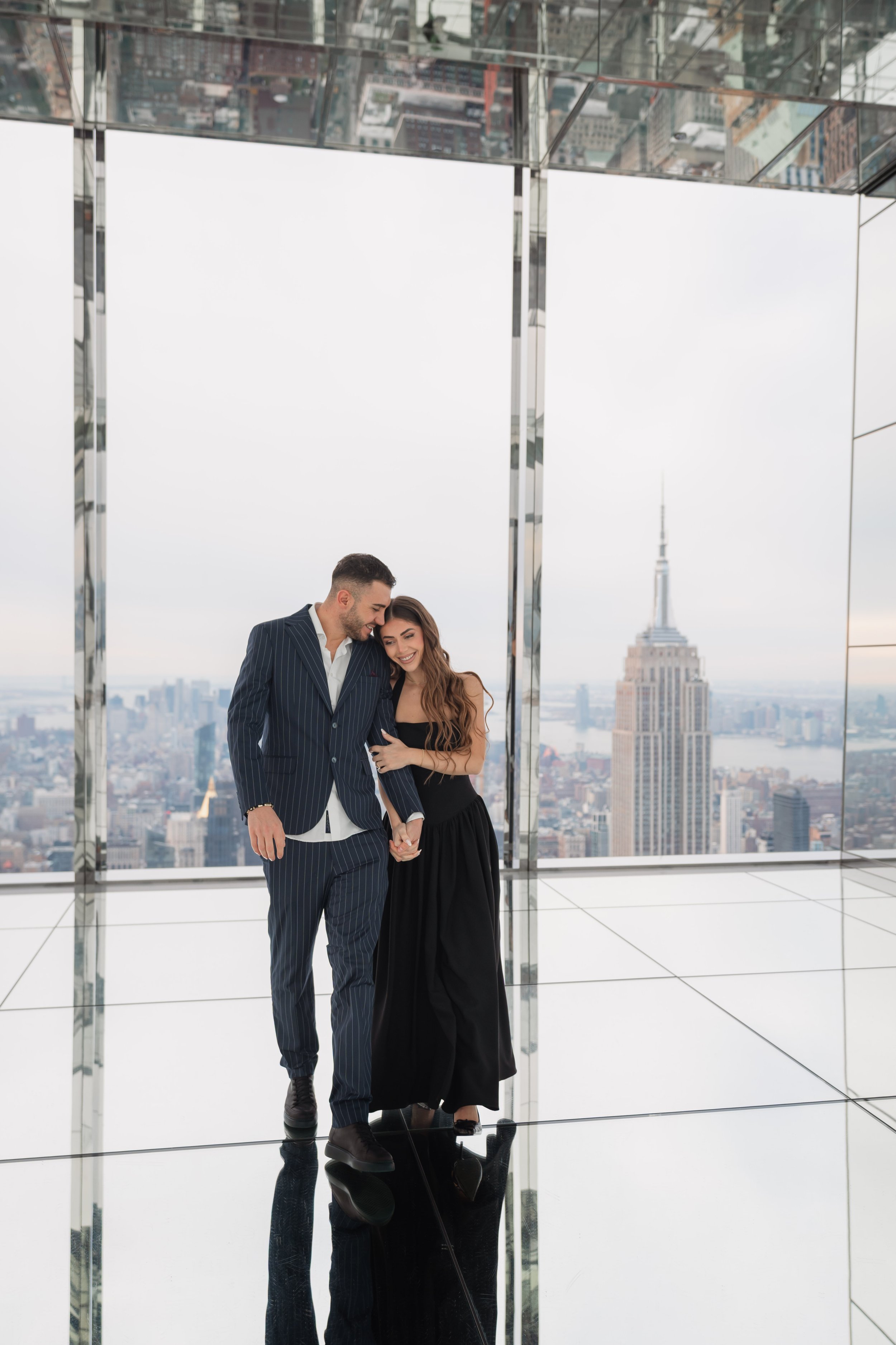 A beautiful marriage proposal and engagement photoshoot at SUMMIT One Vanderbilt in New York City captured by Matt Ritchie