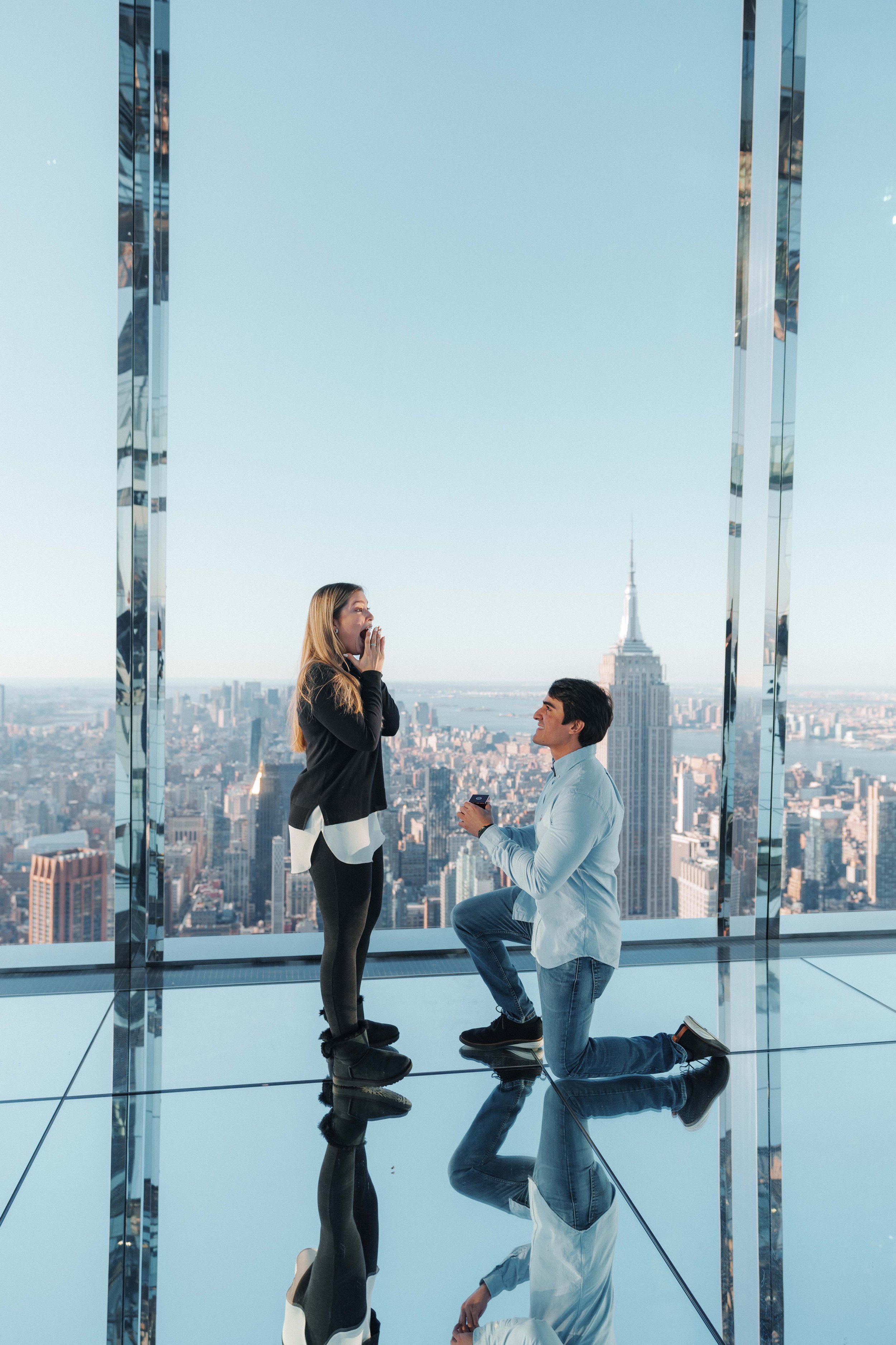 A beautiful marriage proposal and engagement photoshoot at SUMMIT One Vanderbilt in New York City captured by Matt Ritchie