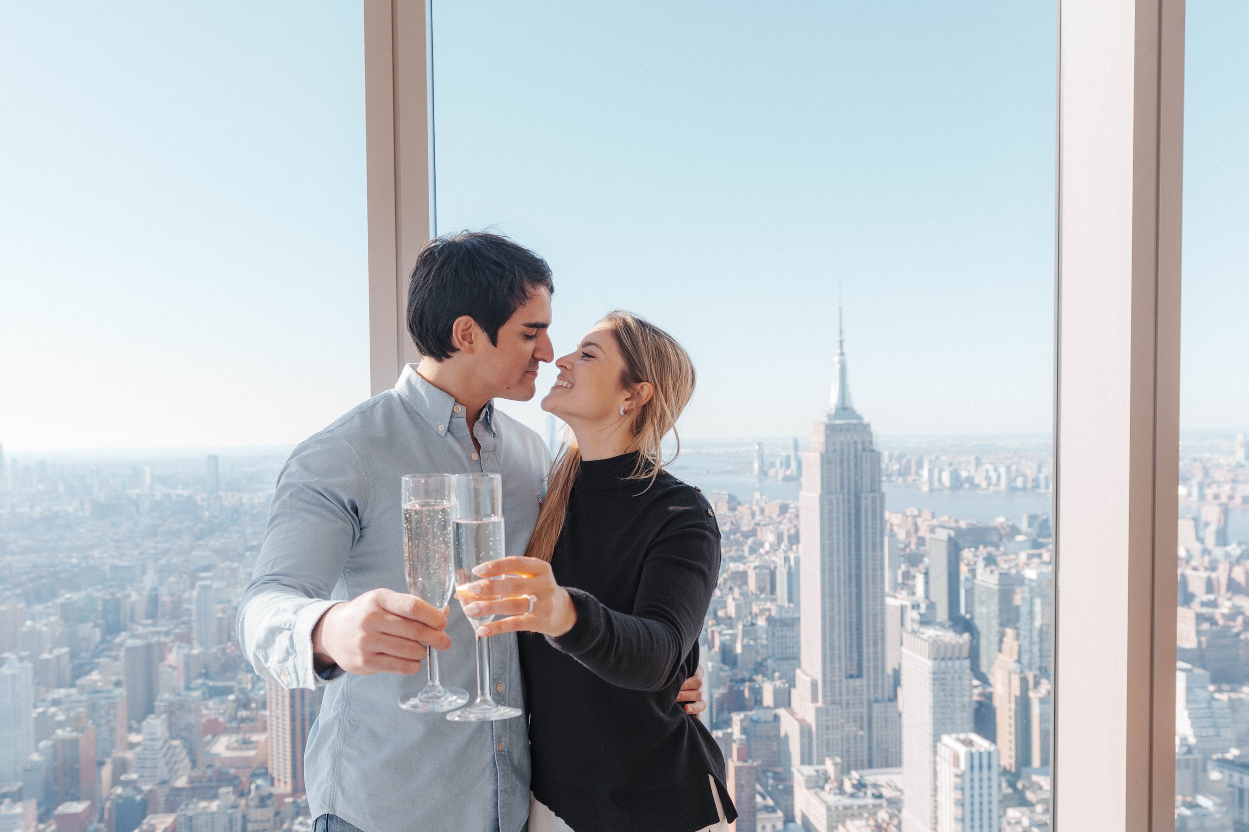 A beautiful marriage proposal and engagement photoshoot at SUMMIT One Vanderbilt in New York City captured by Matt Ritchie