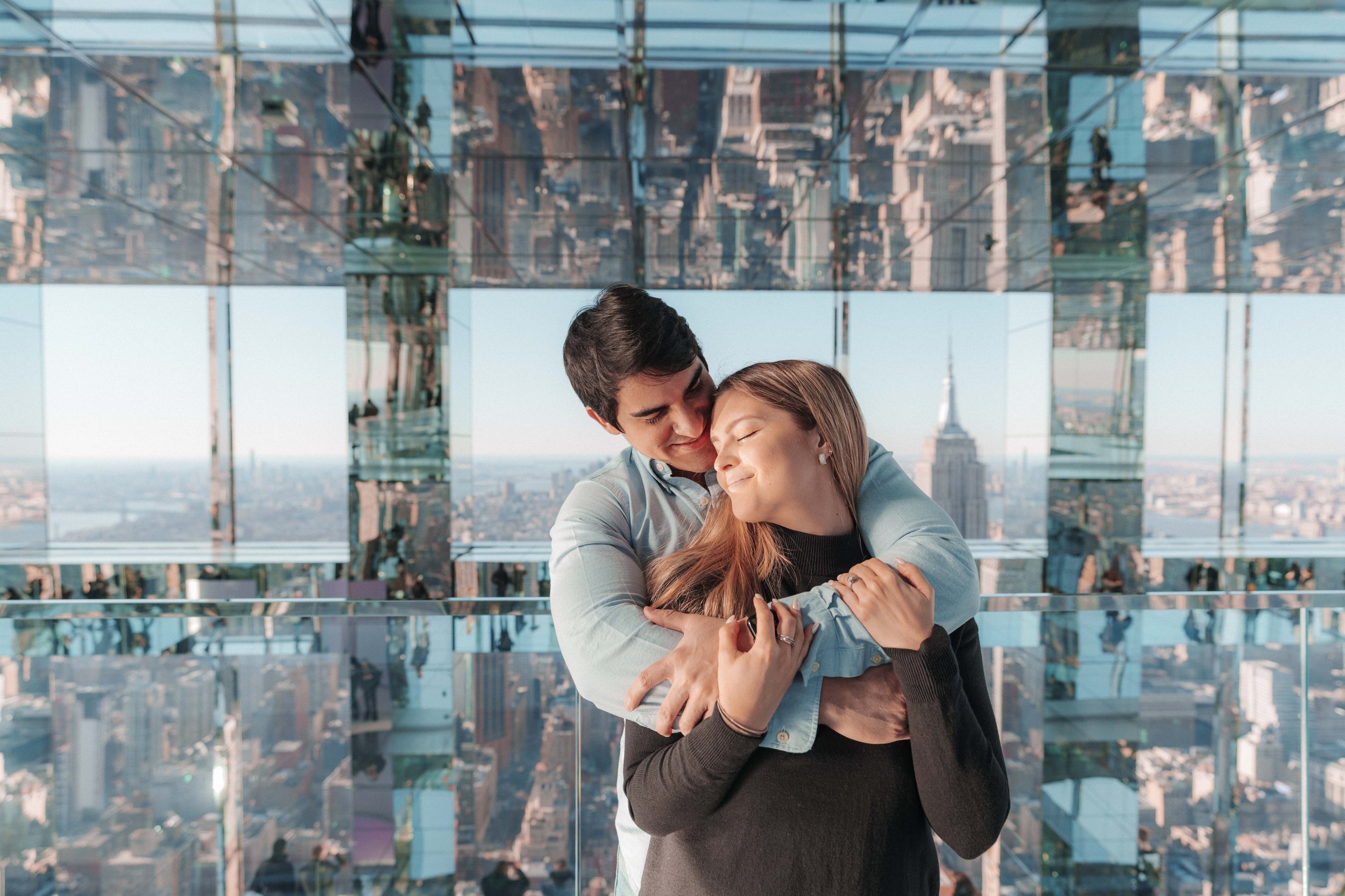 A beautiful marriage proposal and engagement photoshoot at SUMMIT One Vanderbilt in New York City captured by Matt Ritchie