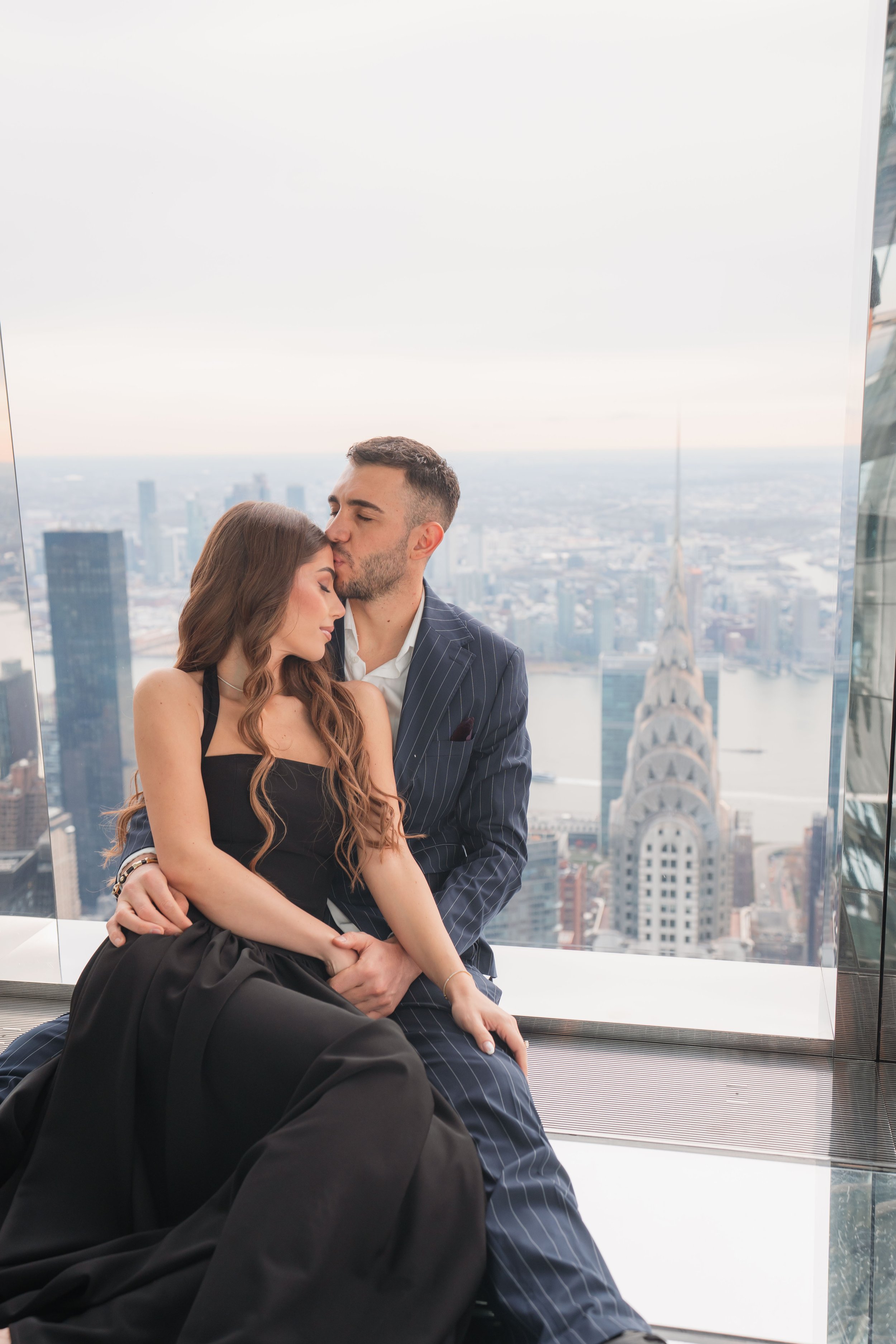 A beautiful marriage proposal and engagement photoshoot at SUMMIT One Vanderbilt in New York City captured by Matt Ritchie