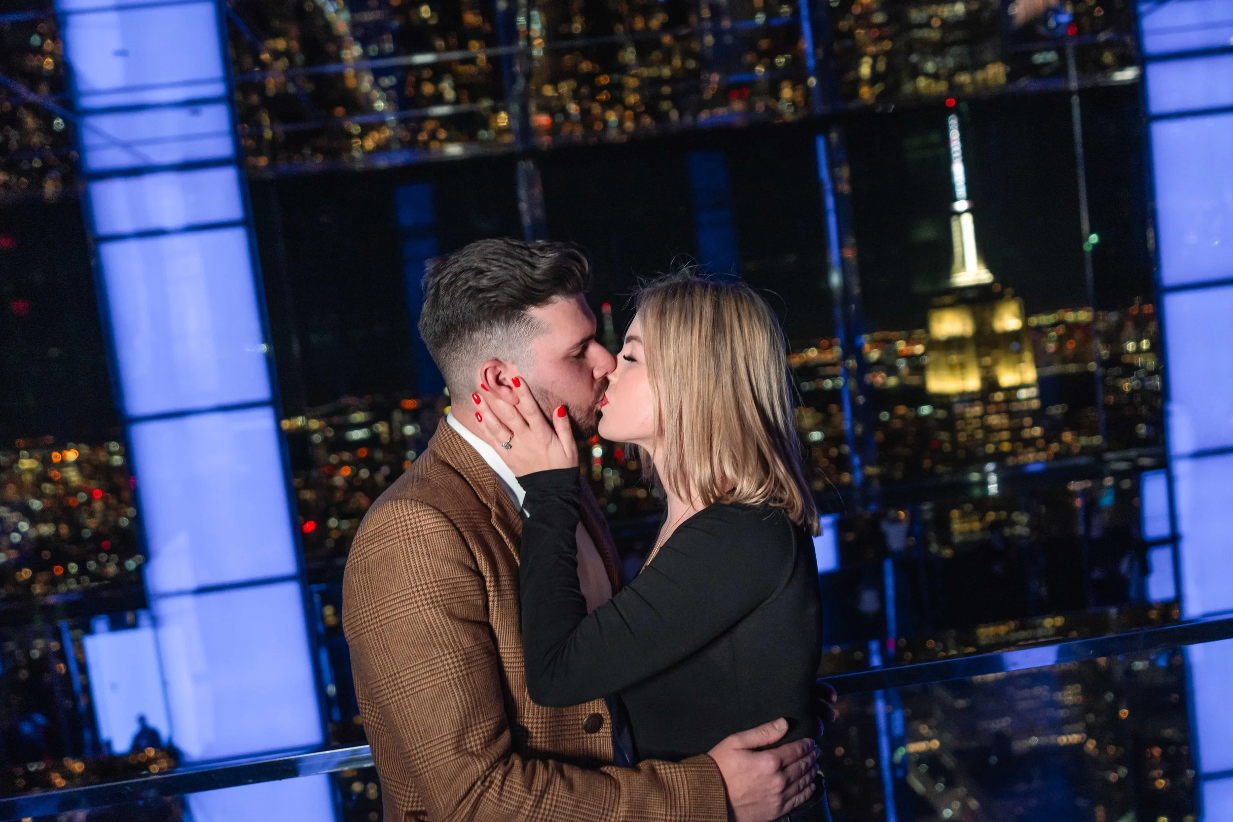 A beautiful marriage proposal and engagement photoshoot at SUMMIT One Vanderbilt in New York City captured by Matt Ritchie