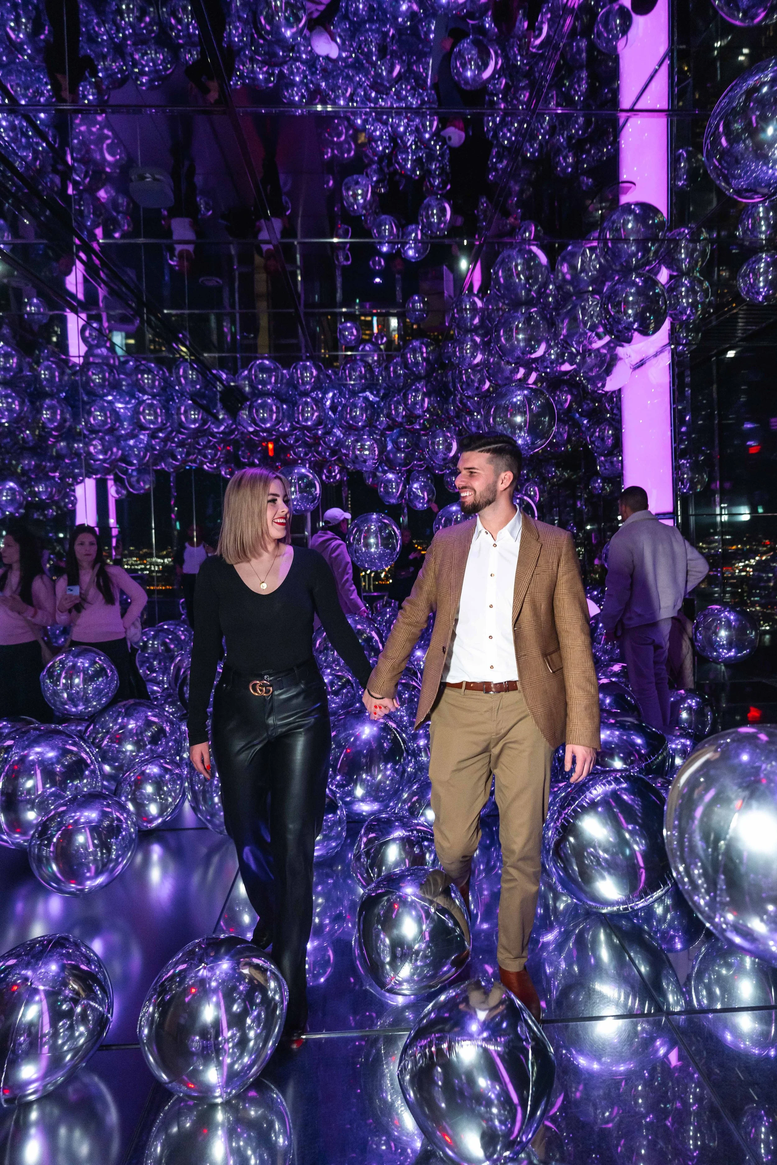 A beautiful marriage proposal and engagement photoshoot at SUMMIT One Vanderbilt in New York City captured by Matt Ritchie