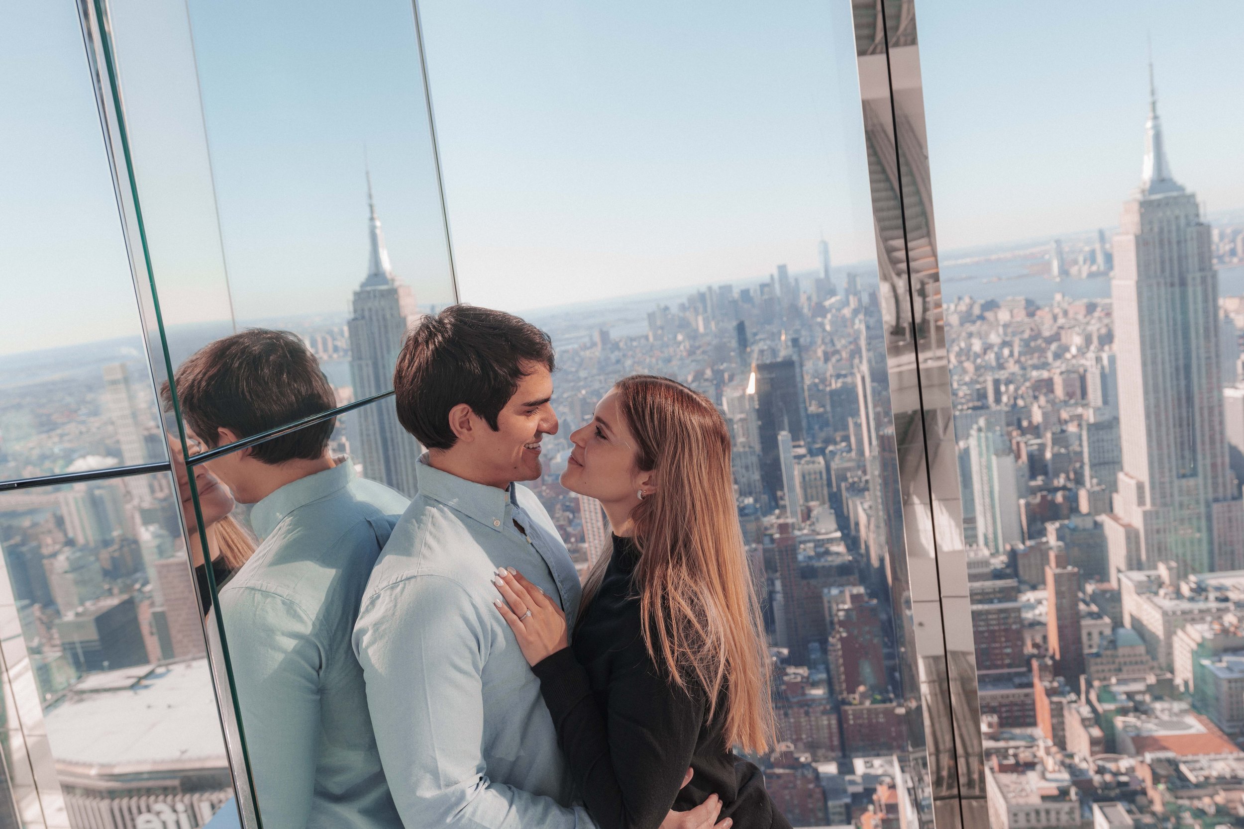 A beautiful marriage proposal and engagement photoshoot at SUMMIT One Vanderbilt in New York City captured by Matt Ritchie